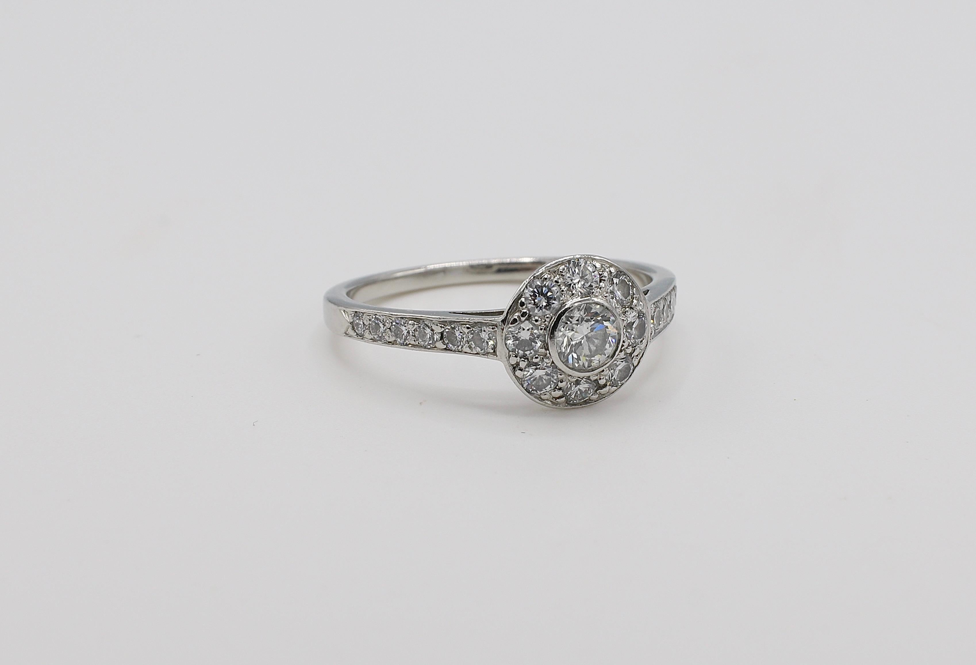 Tiffany & Co. Circlet Collection Platinum Diamond 0.65 CTW Engagement Ring Size 7.5

Metal: Platinum PT950
Weight: 3.87 grams
Diamonds: Approx. .65 CTW F-G VS
Top of ring is 8.5mm 
Size: 7.5 (US)
