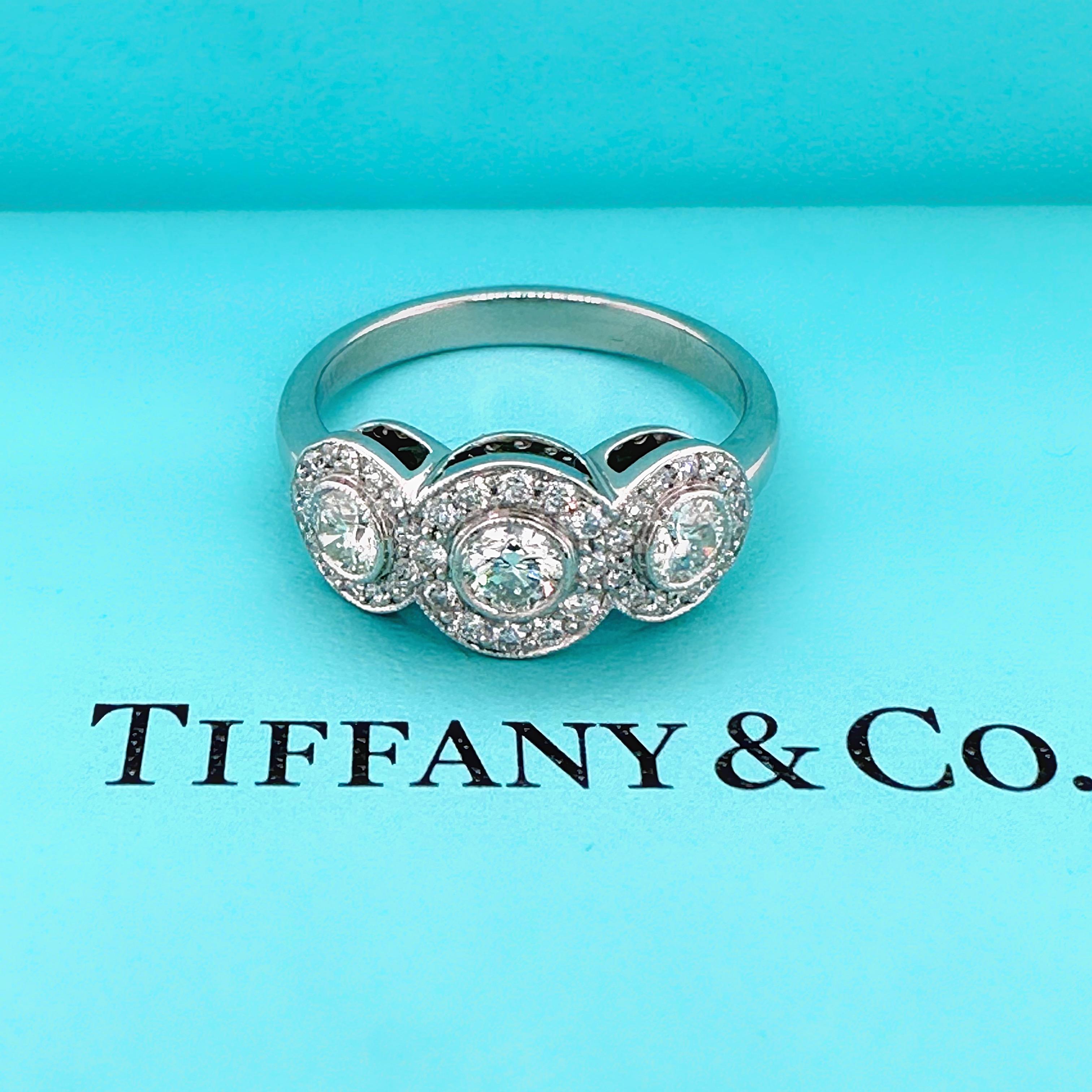 Tiffany & Co. Circlet Ring in Platinum
Style:  Circlet - Ring of diamonds in timeless elegance
Ref. number:  60104036
Metal:  Platinum PT950
Size:  6 - sizable
TCW:  0.53 tcw 
Main Diamond:  3 Round Brilliant Diamonds
Accent Diamonds:  40 Round