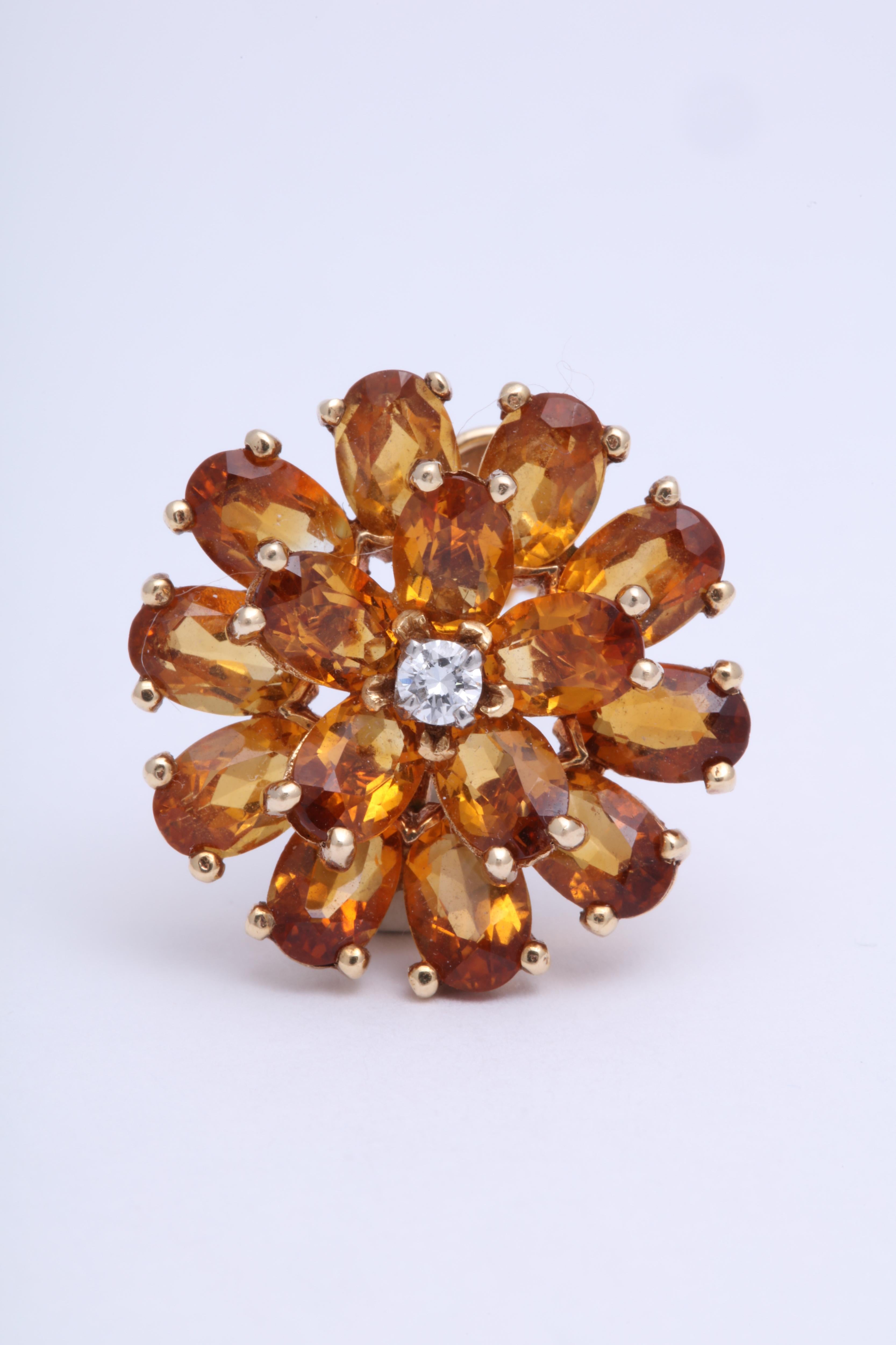 Tiffany floral cluster earrings in 18K yellow gold set with citrine and a central diamond. c. 1945
