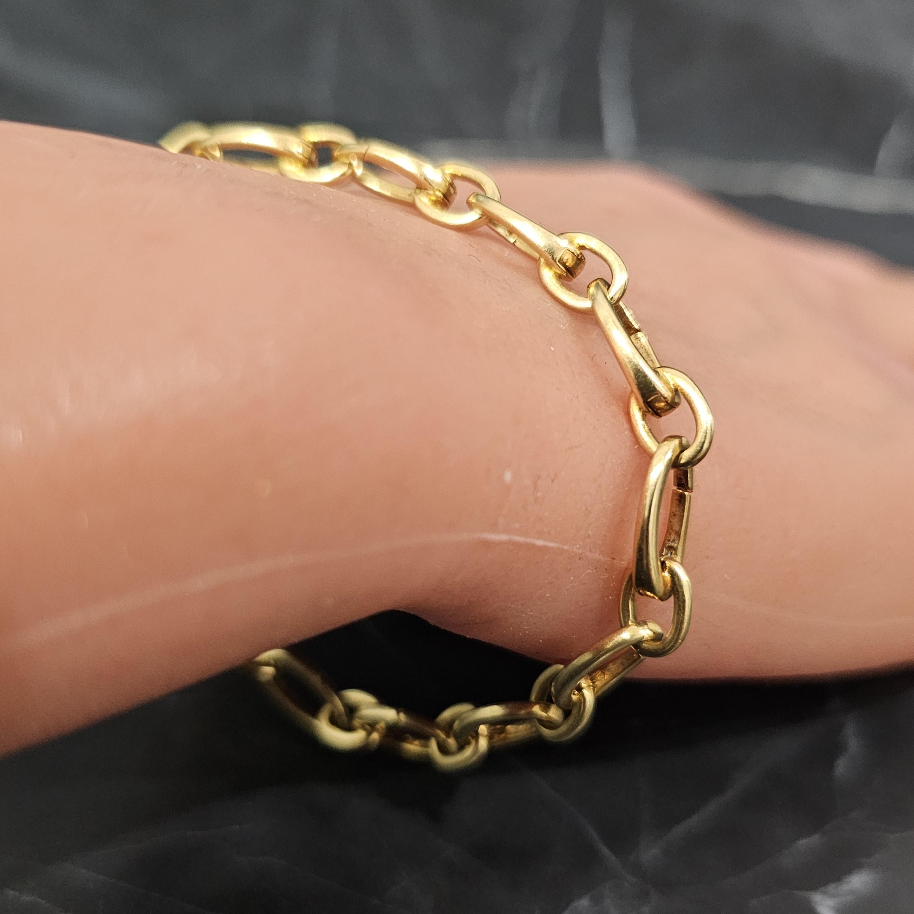 Tiffany & Co. Clasping Charm Bracelet Each Oval link Opens 18k Yellow gold 7.5