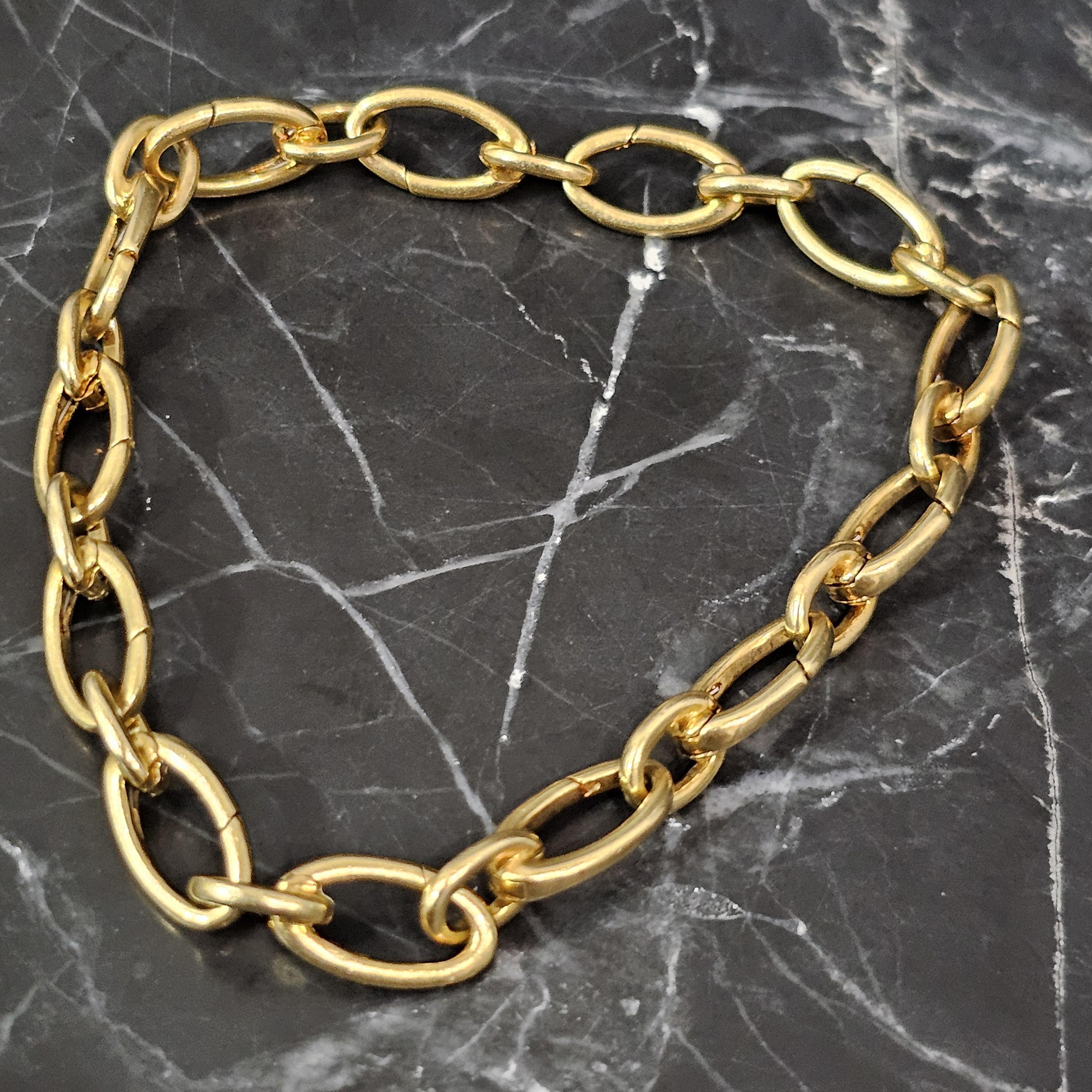 Tiffany & Co. Clasping Charm Bracelet Each Oval link Opens 18k Yellow gold 7.5
