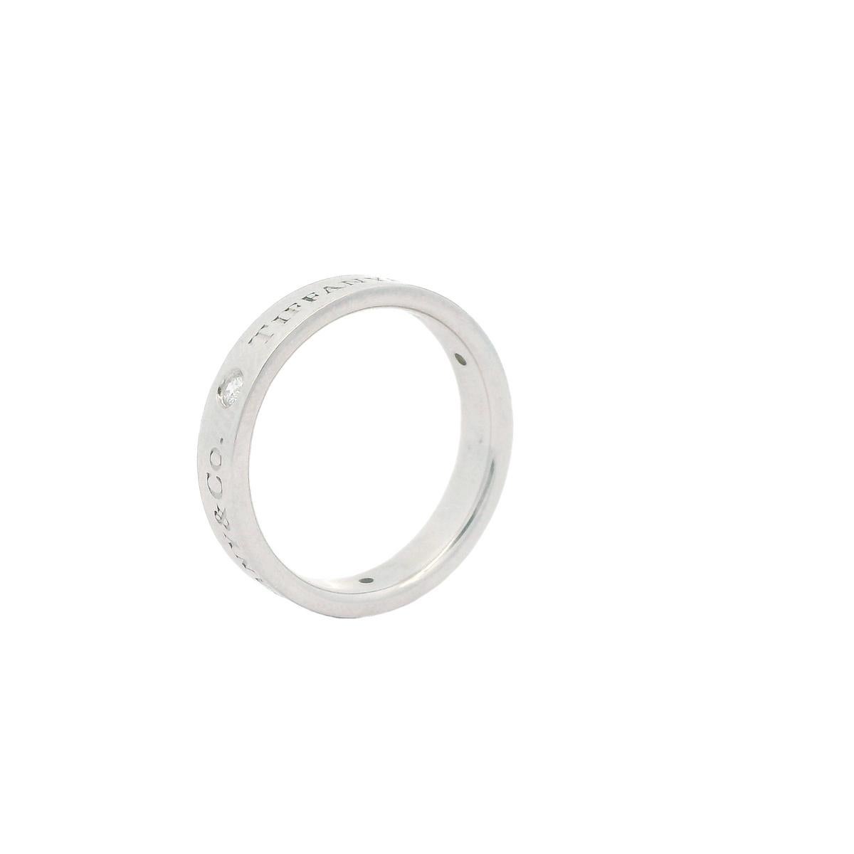 Tiffany & Co. Classic Band Ring 4mm Platinum 3 Round Brilliant Diamonds In Excellent Condition For Sale In Newton, MA