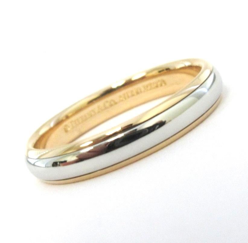 TIFFANY & Co. Classic Platinum 18K Rose Gold 4mm Lucida Wedding Band Ring 9.5

Metal: Platinum and 18K Rose Gold
Size: 9.5
Band Width: 4mm
Weight: 6.10 grams
Hallmark: ©TIFFANY&CO. AU750 PT950
Condition: Excellent condition, like new

Authenticity