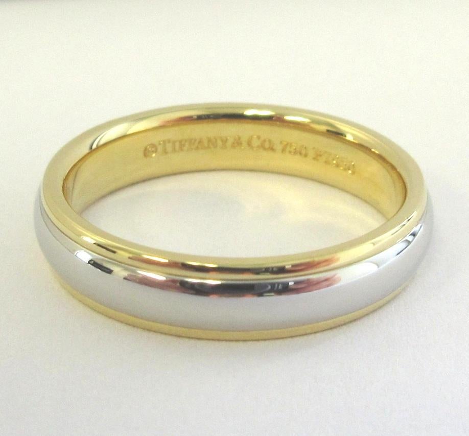 TIFFANY & Co. Anello classico di platino in oro giallo 18 carati 4mm Lucida Wedding Band 5,5 

Metallo: Platino e oro giallo 18 carati
Dimensione: 5.5 
Larghezza della banda: 4 mm
Peso: 5,40 grammi
Punzone: ©TIFFANY&CO. 750 PT950
Condizioni: Ottime