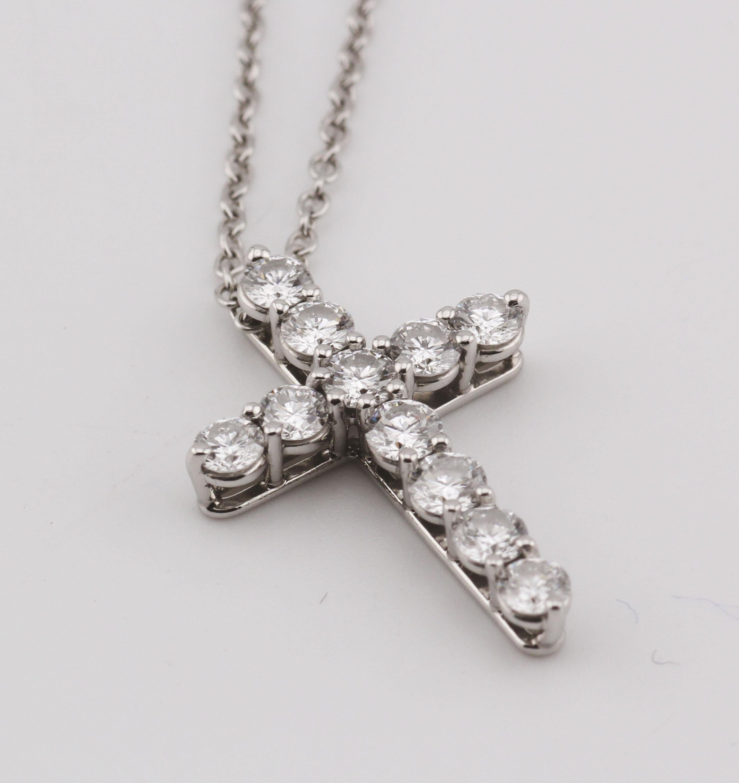 Tiffany & Co. Classic Small Diamond Platinum Cross Pendant Necklace In Good Condition For Sale In Simpsonville, SC