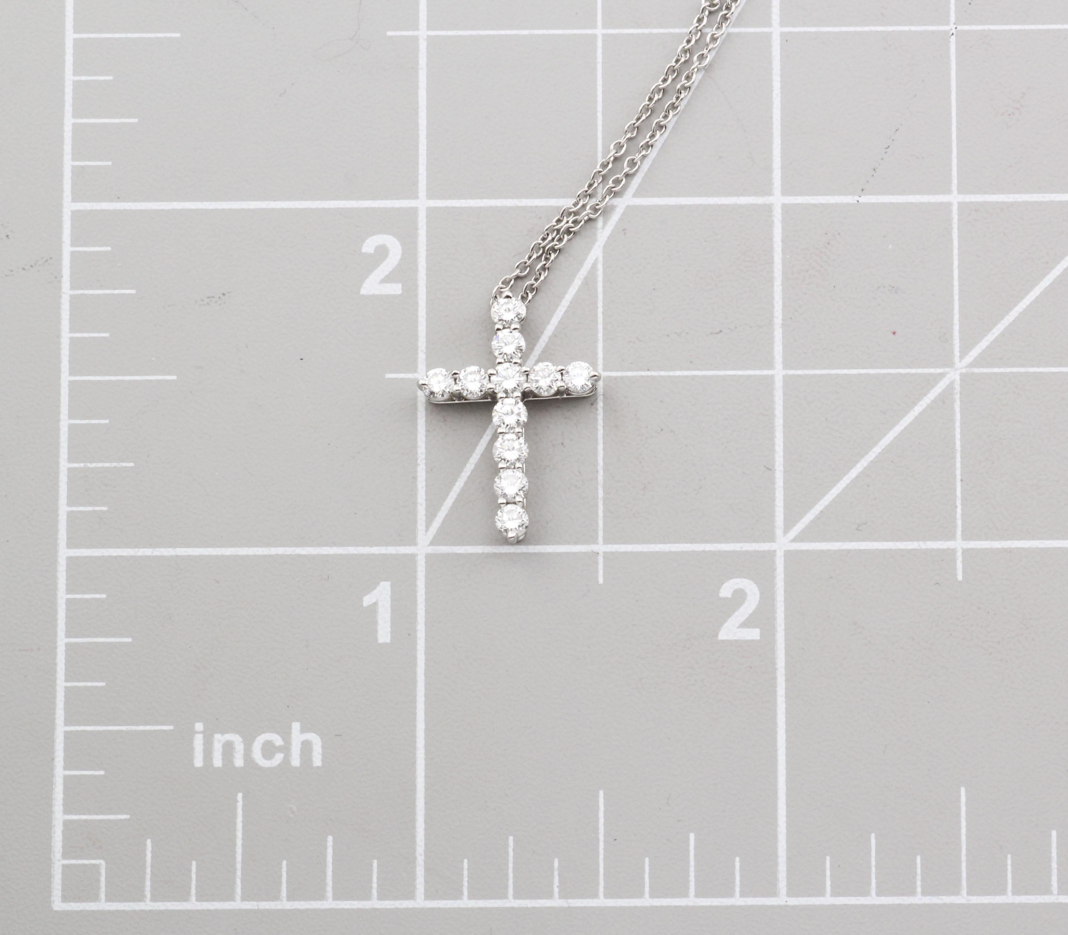 Tiffany & Co. Classic Small Diamond Platinum Cross Pendant Necklace For Sale 3