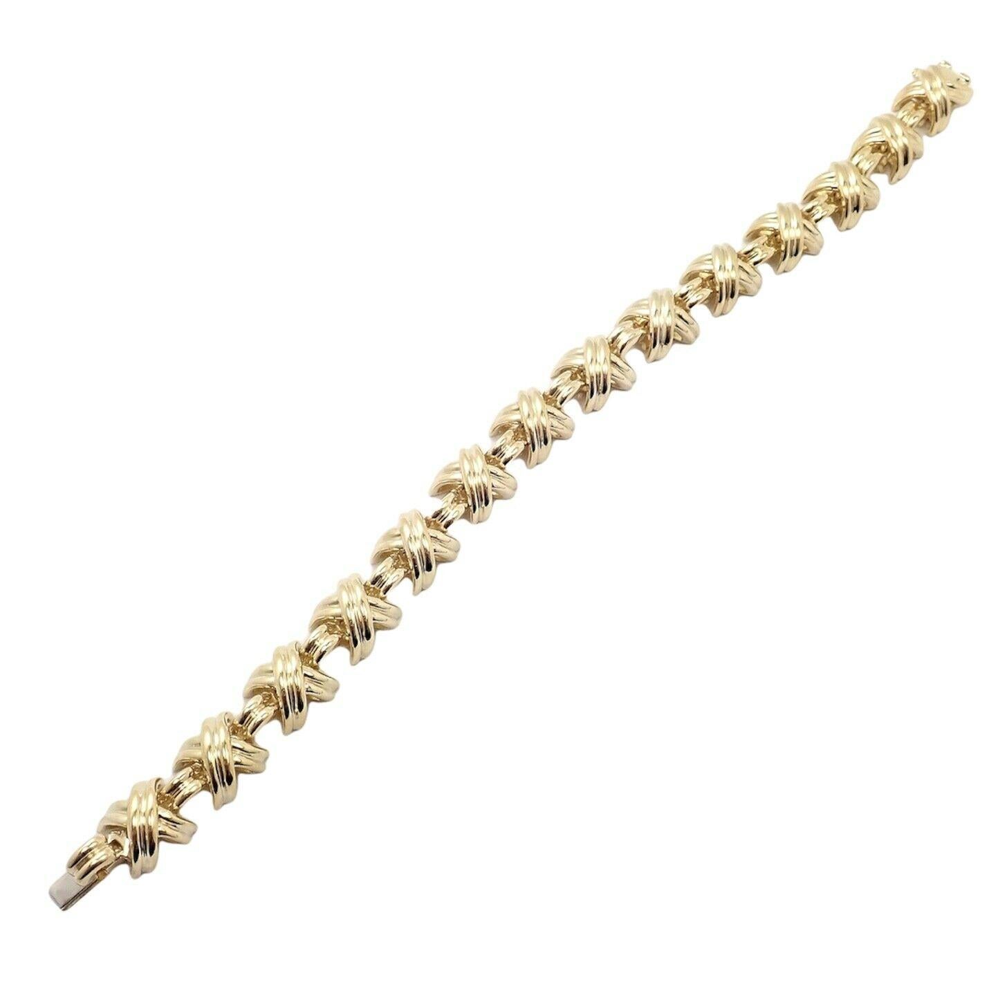 Klassisches X-Gliederarmband aus 18k Gelbgold von Tiffany & Co. 
Einzelheiten: 
Länge: 7,25