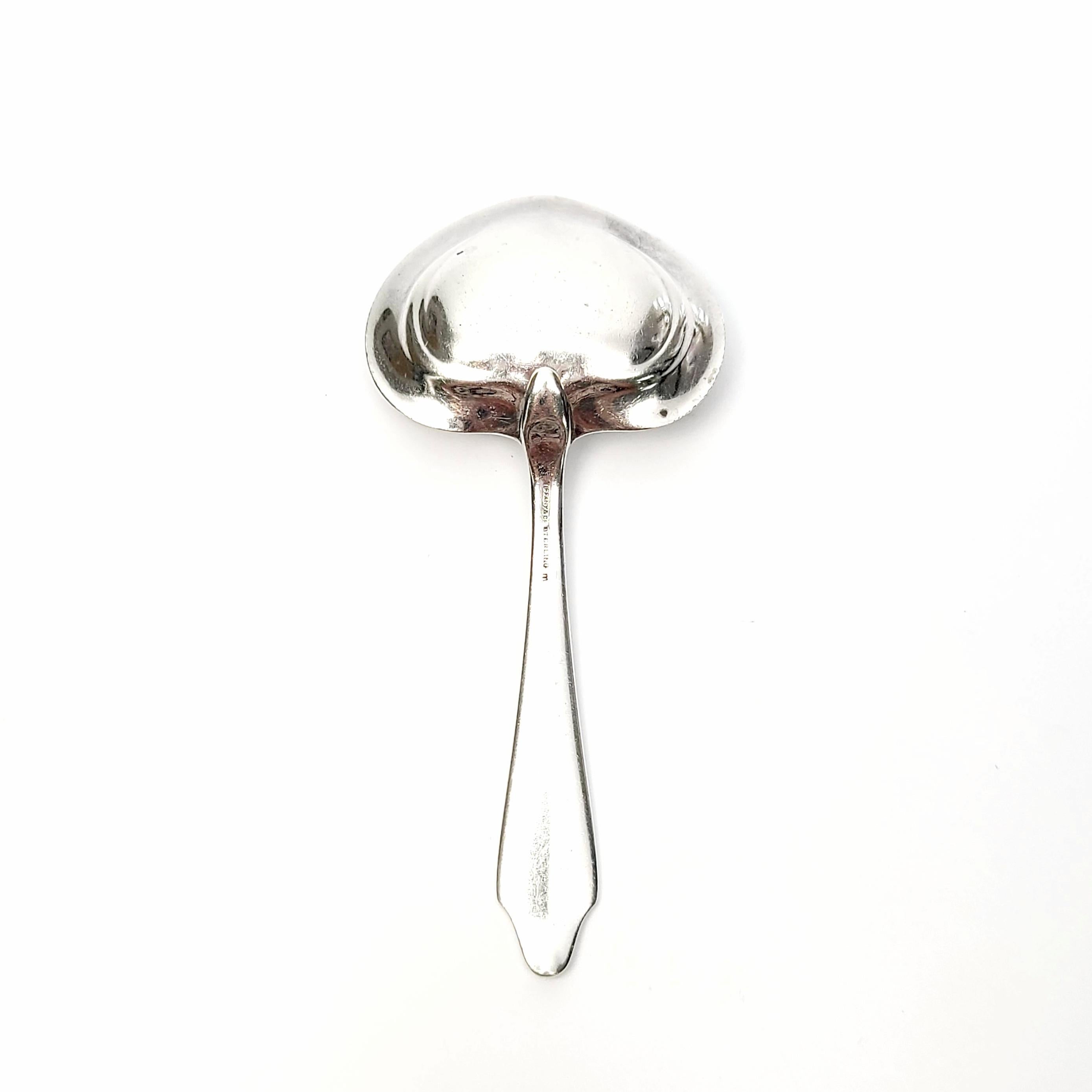 Sterling silver bon bon spoon by Tiffany & Co in the Clinton pattern.

Monogram appears to be A.vD

Beautiful small bon bon spoon with a heart shaped bowl. The Clinton pattern was in production from 1912-1955. The pattern's clean and timeless