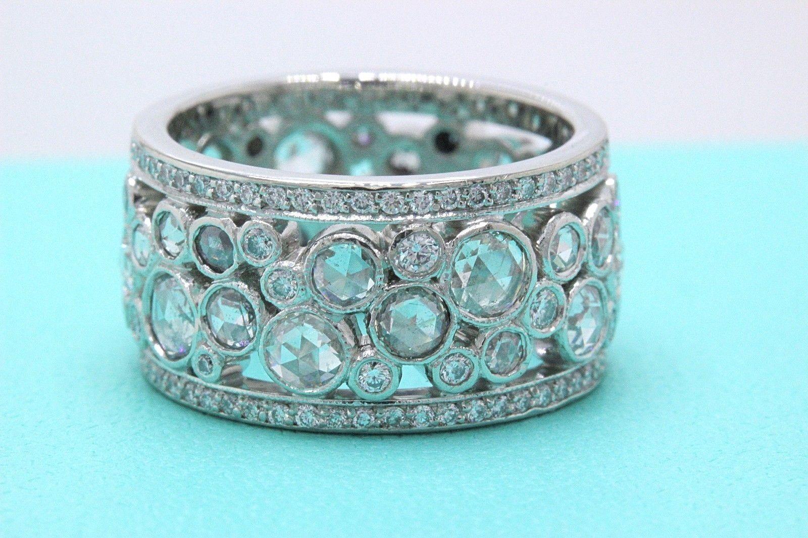 Tiffany & Co. 
Style:  Cobblestone Diamond Band Ring
Metal:  Platinum
Width:  10 MM
Size:  4.5 
Total Carat Weight:  2.12 TCW
Diamond Shape:  Rose-cuts Diamond 1.61 TCW & Round Brilliant Diamonds 0.51 TCW
Diamond Color & Clarity:  F / VS
Hallmark: 