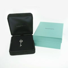 Tiffany & Co. Cobblestone Platinum .53ct Ruby Diamond Lock Key Charm Pendant