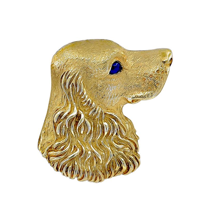 Realistic well-detailed brooch that looks like a portrait of an actual dog. Made and signed by TIFFANY & CO.  Very heavy gauge 18K yellow gold. Deep velvety cabochon sapphire eye.  1 1/8