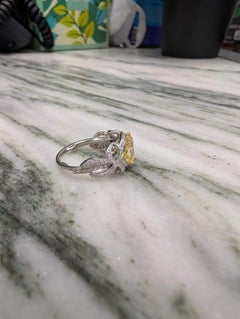 Tiffany & Co. Collector's 2.32 Carat Fancy Vivid Yellow Cushion Cut Diamond Ring