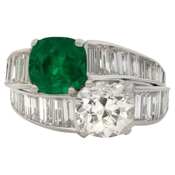 Tiffany & Co. Colombian Emerald and Diamond Crossover Ring, American, circa 1930 For Sale