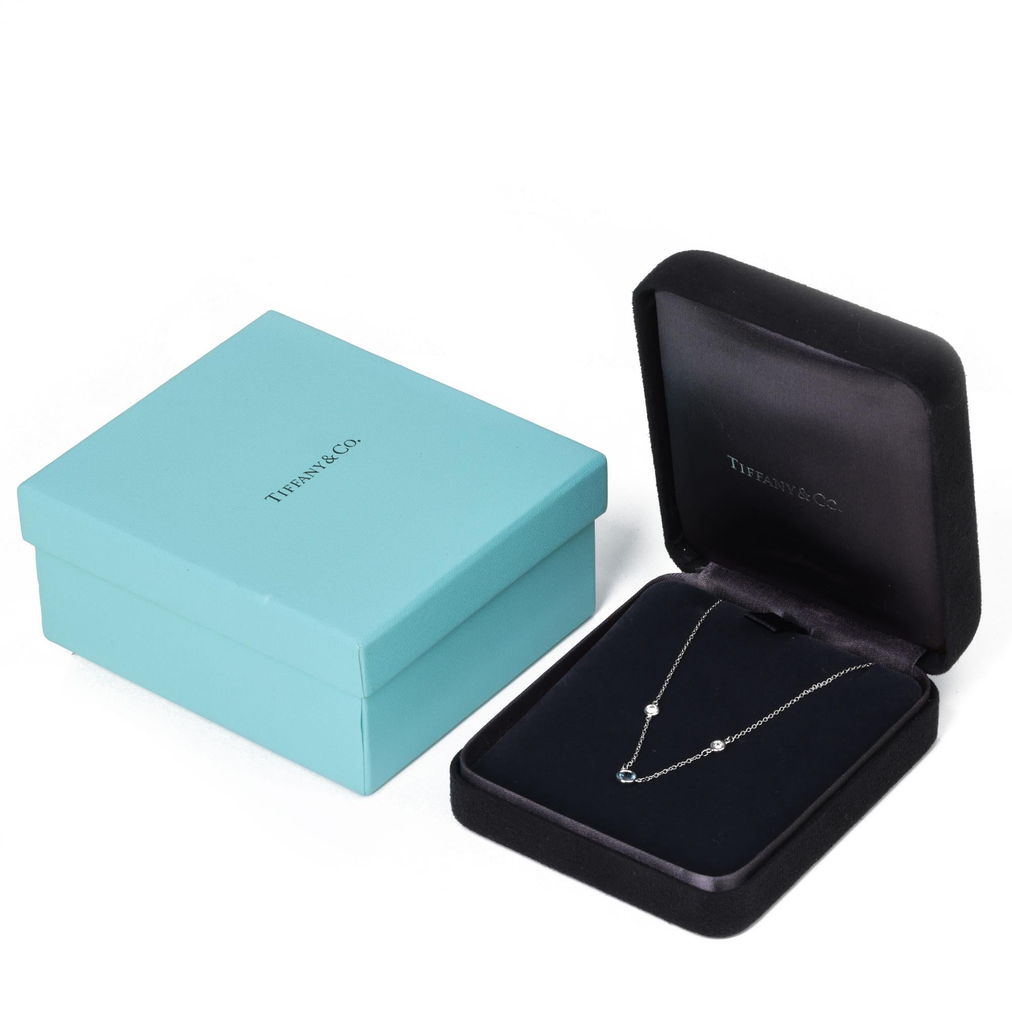This necklace by Tiffany & Co. is from their Elsa Peretti Colours by the Yard collection, it features two round brilliant cut diamonds and one Aquamarine set in a Platinum chain. Accompanied with a Tiffany box.

Details
J845
Tiffany & Co.
Elsa