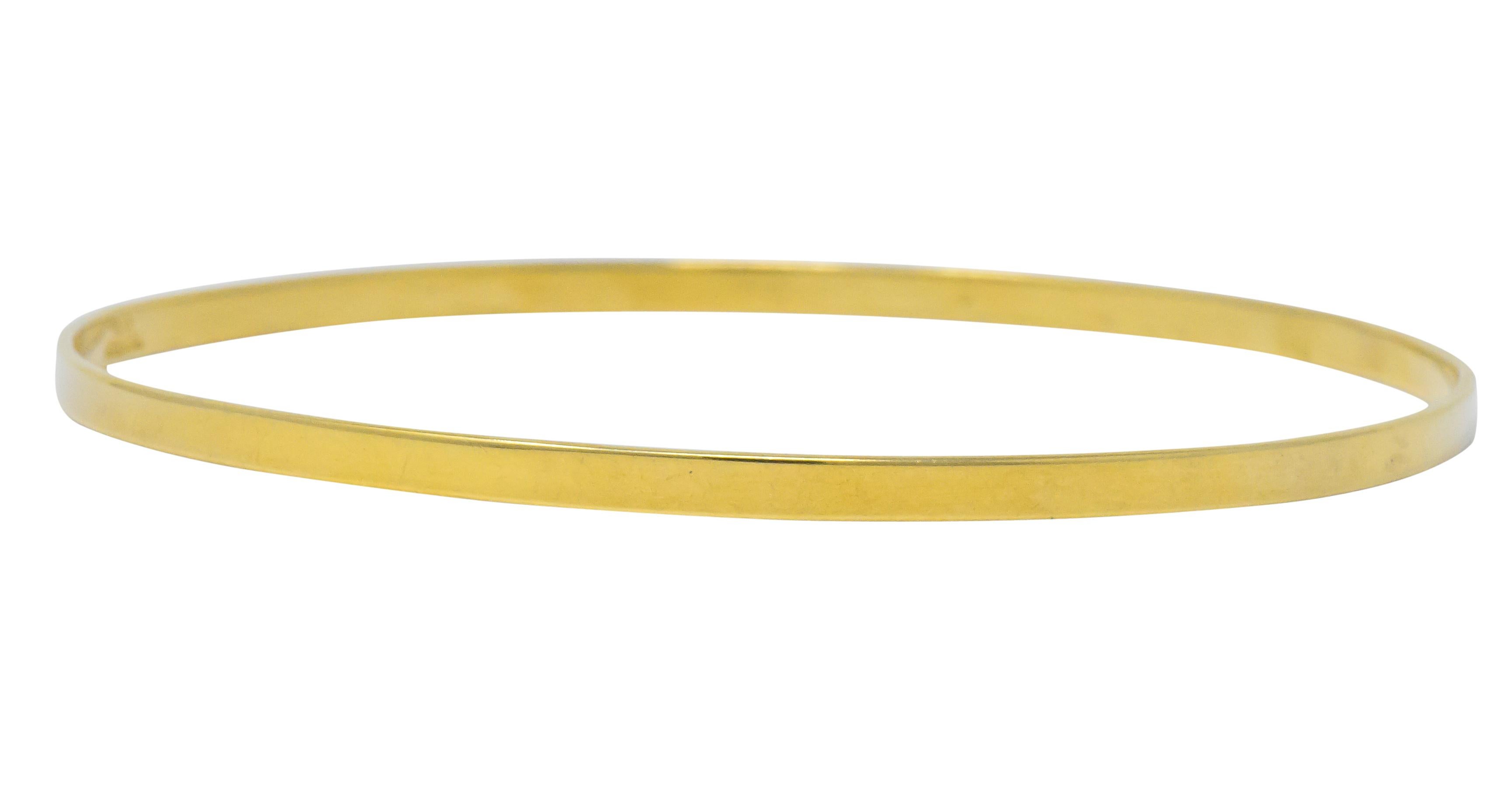 Smooth high polished gold bangle

Fully signed Tiffany & Co. and stamped 14K

Inner Circumference: 7 3/4 inches

Width Measures: 1/8 inch

Total Weight: 6.5 grams

Dignified. Stylish. Graceful.
 
Stock Number: We- 2660