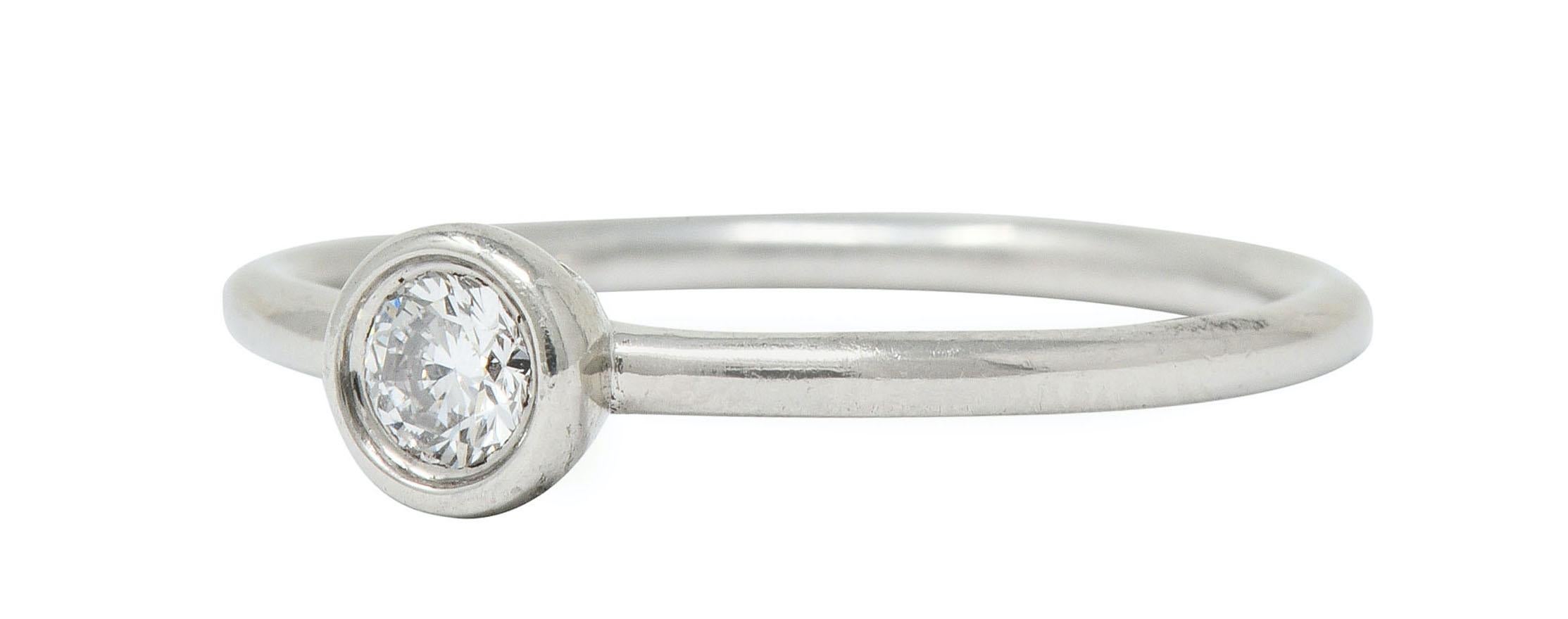 Tiffany & Co. Contemporary Diamond Platinum Bezet Solitaire Ring In Excellent Condition For Sale In Philadelphia, PA