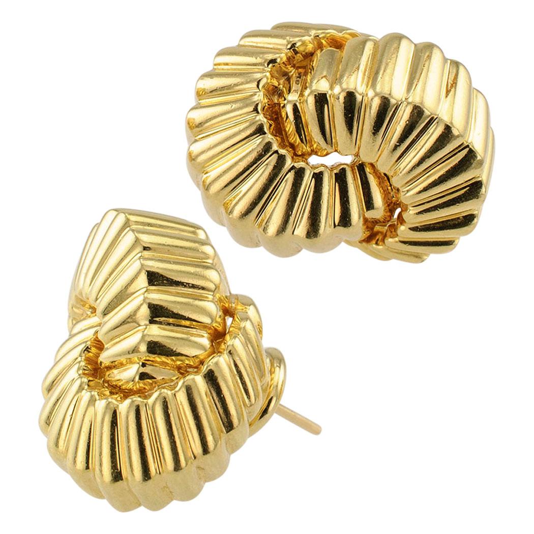 Tiffany & Co. Cordis 18-karat yellow gold clip on earrings circa 1998.  Excellent condition consistent with age and wear.  With omega clip backs. 
 Why not Love Yourself a little with these wonderful Tiffany earrings as a treat for today?  And if