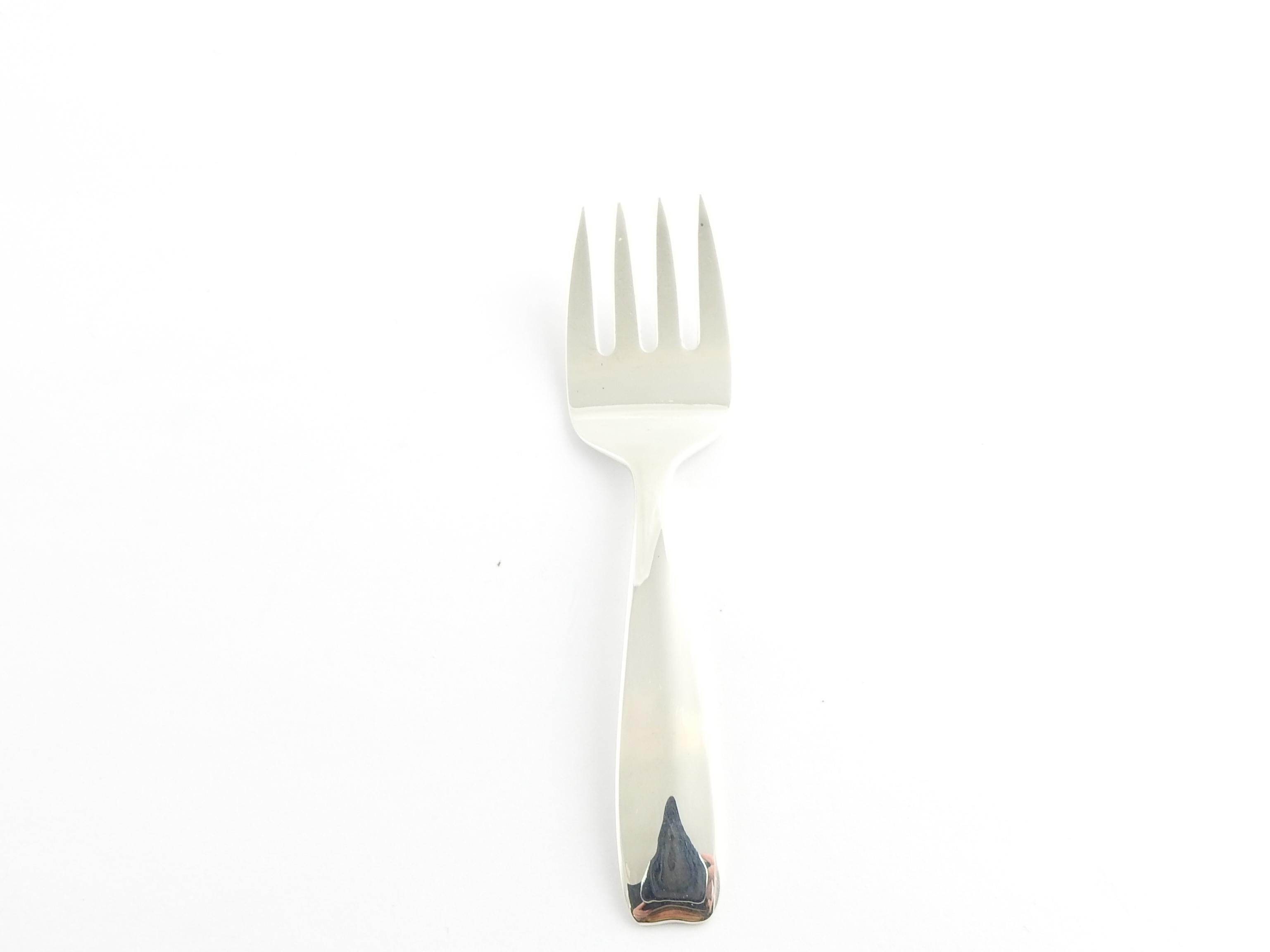 Vintage Cordis Tiffany & Co. sterling silver baby feeding fork

This authentic Tiffany & Co. feeding fork is approx. 4