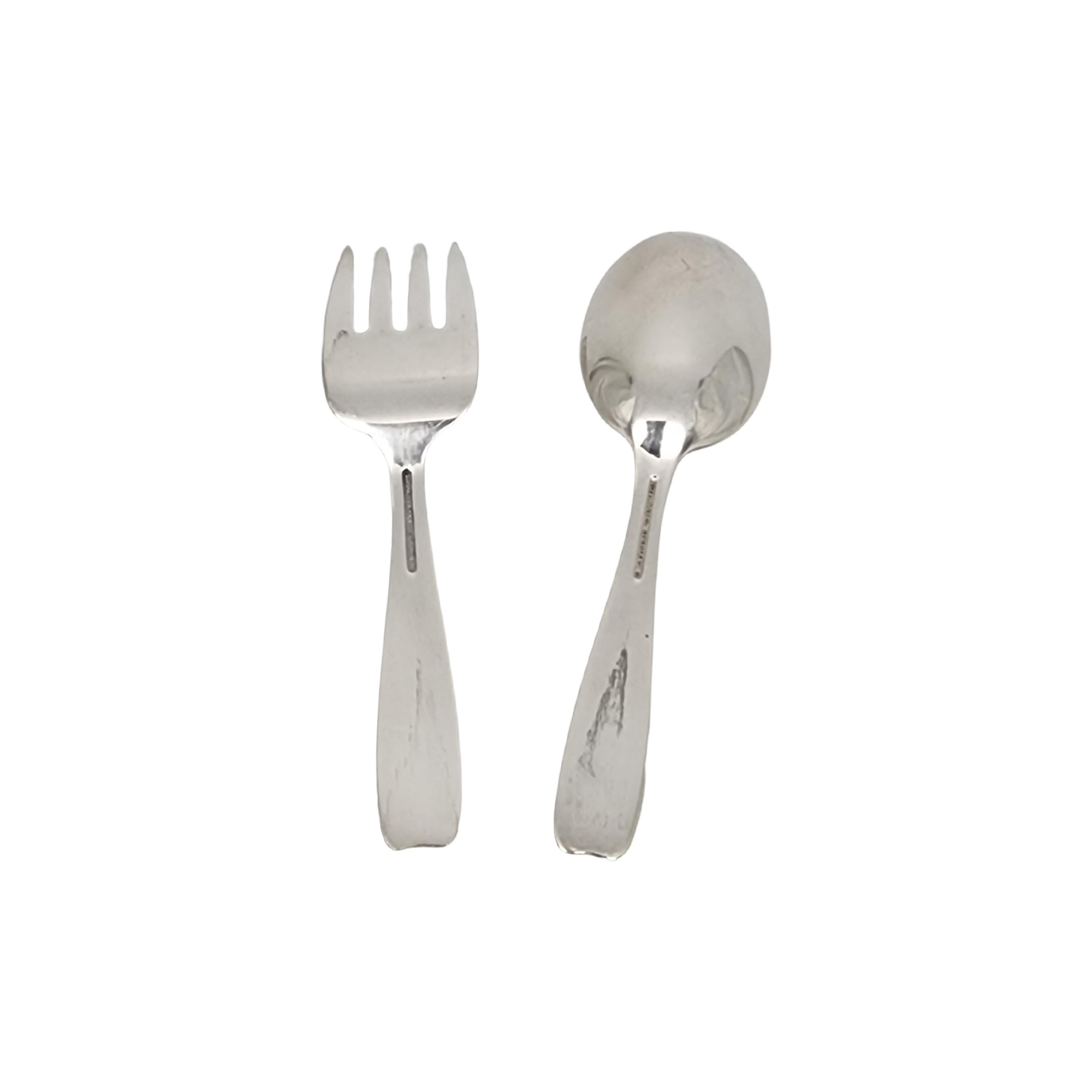 Tiffany & Co sterling silver child/baby feeding fork and spoon in the Cordis pattern.

No monogram or engraving

A small fork and spoon in the Cordis pattern, a simple and classic design. Hallmarks date this piece to manufacture under the