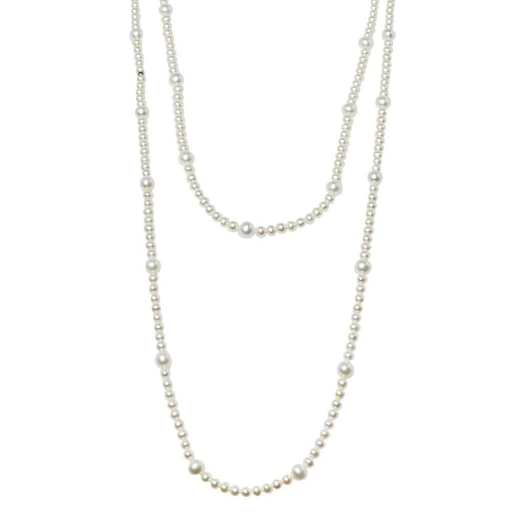 There is nothing more elegant and ladylike than a classic pearl necklace. This Tiffany & Co. necklace has pearls linked in a silver chain. The dual strands add a more layered look to the exquisite creation.

Includes: Original Box, Original Dustbag