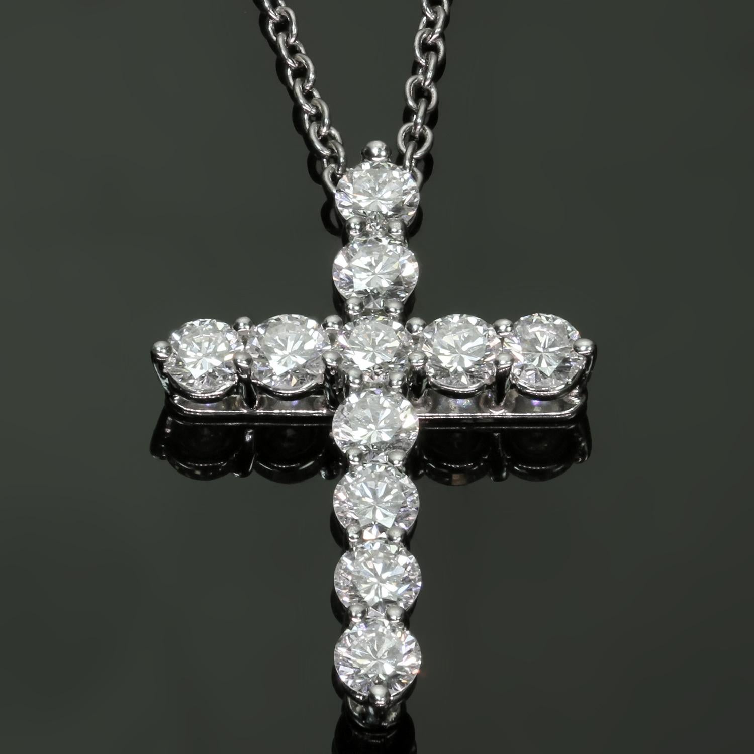 This exquisite authentic Tiffany & Co. necklace features a cross pendant crafted in platinum and set with round brilliant F-G-H VVS1-VVS2 diamonds weighing an estimated 0.40 carats. Made in United States circa 2020s. Measurements: 16.75