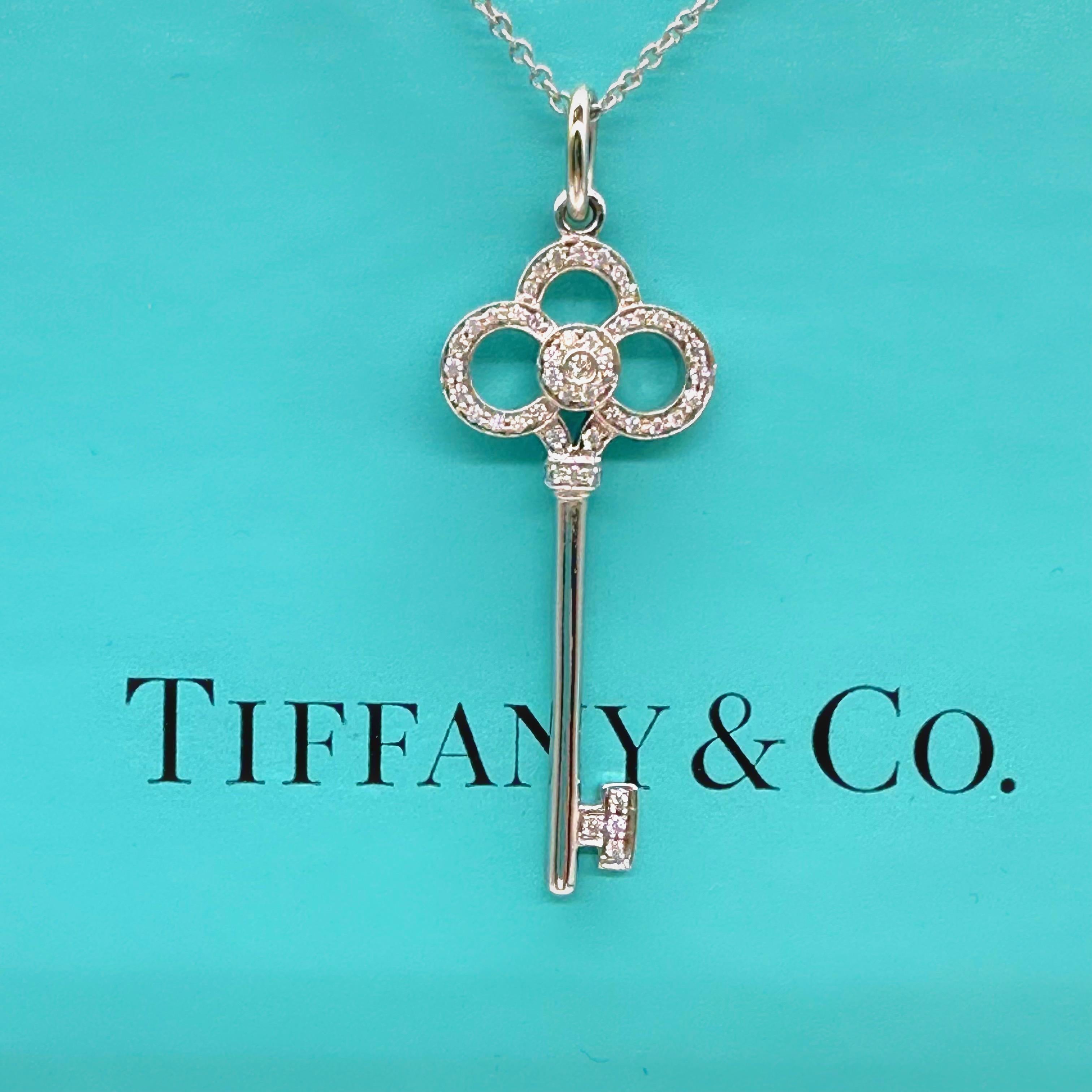 Round Cut Tiffany & Co. Crown Key Diamond Pendant Necklace 18kt White Gold For Sale