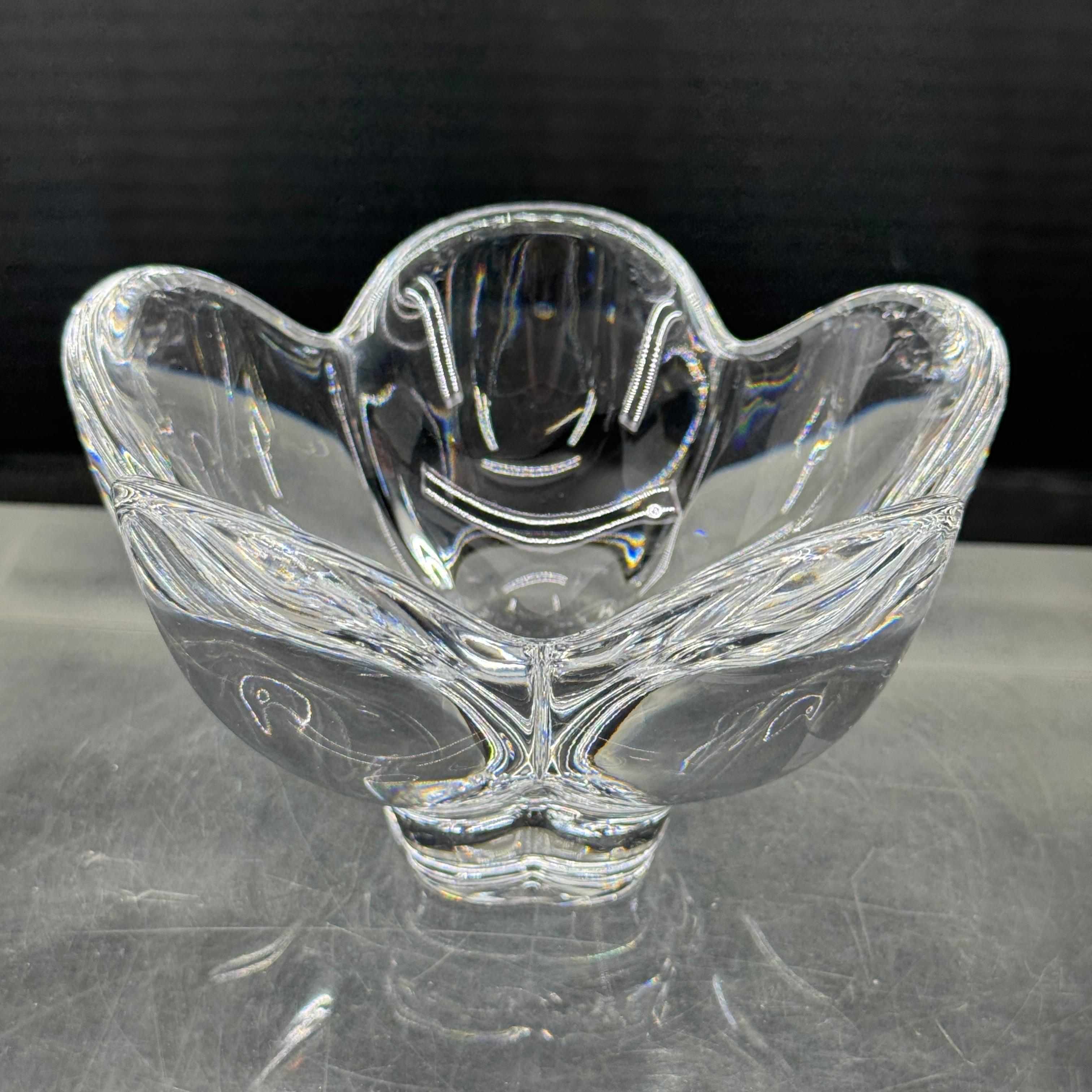 Thick and certainly a very versatile piece that can function as a trinket bowl for your favorite candy as well as place to hold you jewelry on a vanity table. 