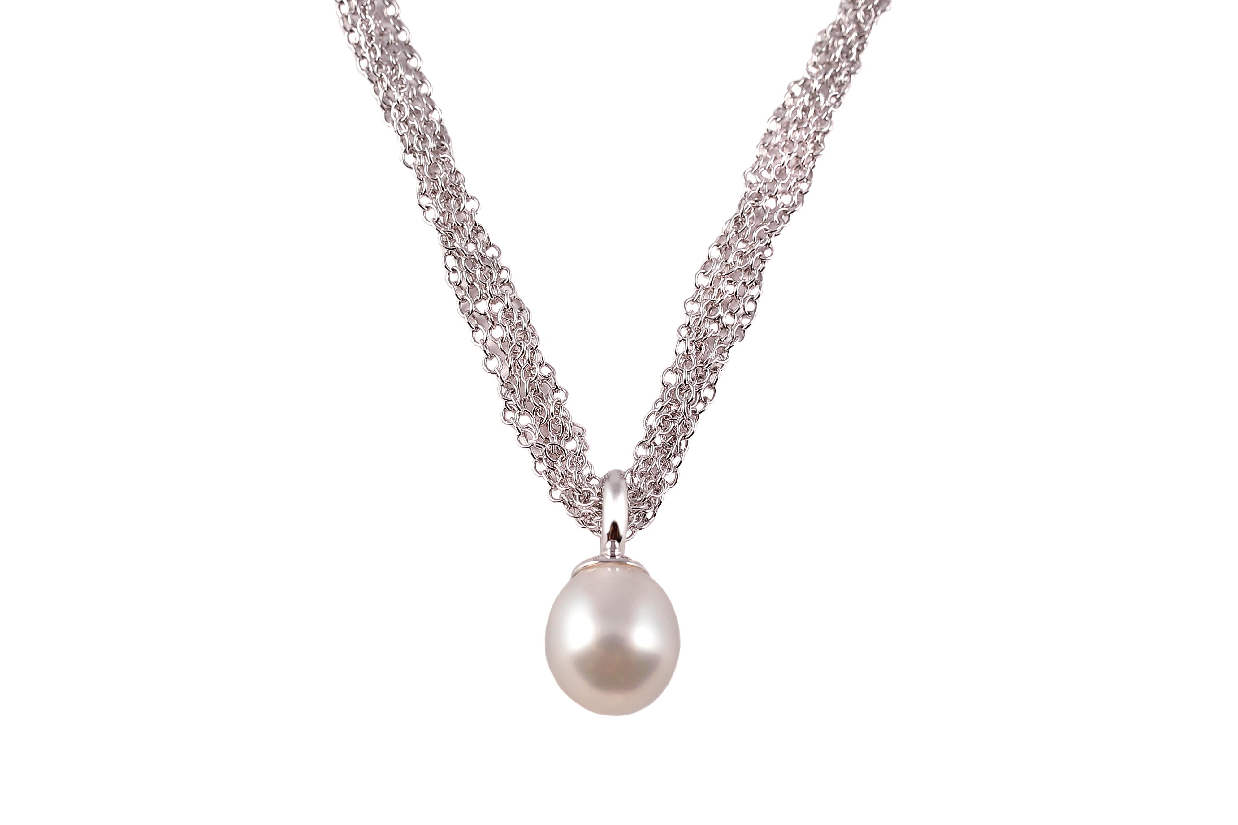 Fun and swingy! This 10.50 mm x 12.00 mm cultured pearl is suspended from a 6 row, interlocking link chain which is secured with a toggle clasp.
