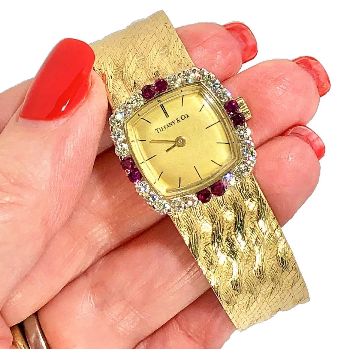 Tiffany & Co. Cushion Shaped Diamond and Ruby Bezel Watch in Yellow Gold In Good Condition For Sale In Palm Beach, FL