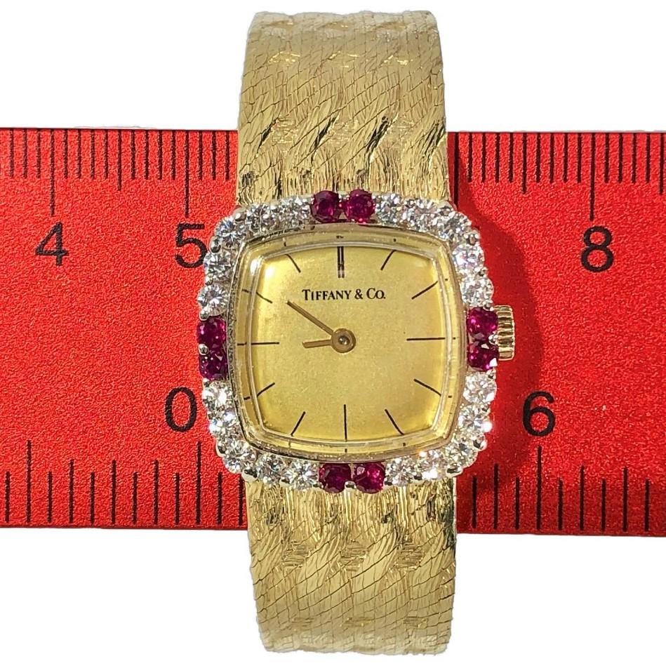 Women's Tiffany & Co. Cushion Shaped Diamond and Ruby Bezel Watch in Yellow Gold For Sale