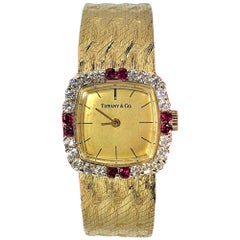 Vintage Tiffany & Co. Cushion Shaped Diamond and Ruby Bezel Watch in Yellow Gold