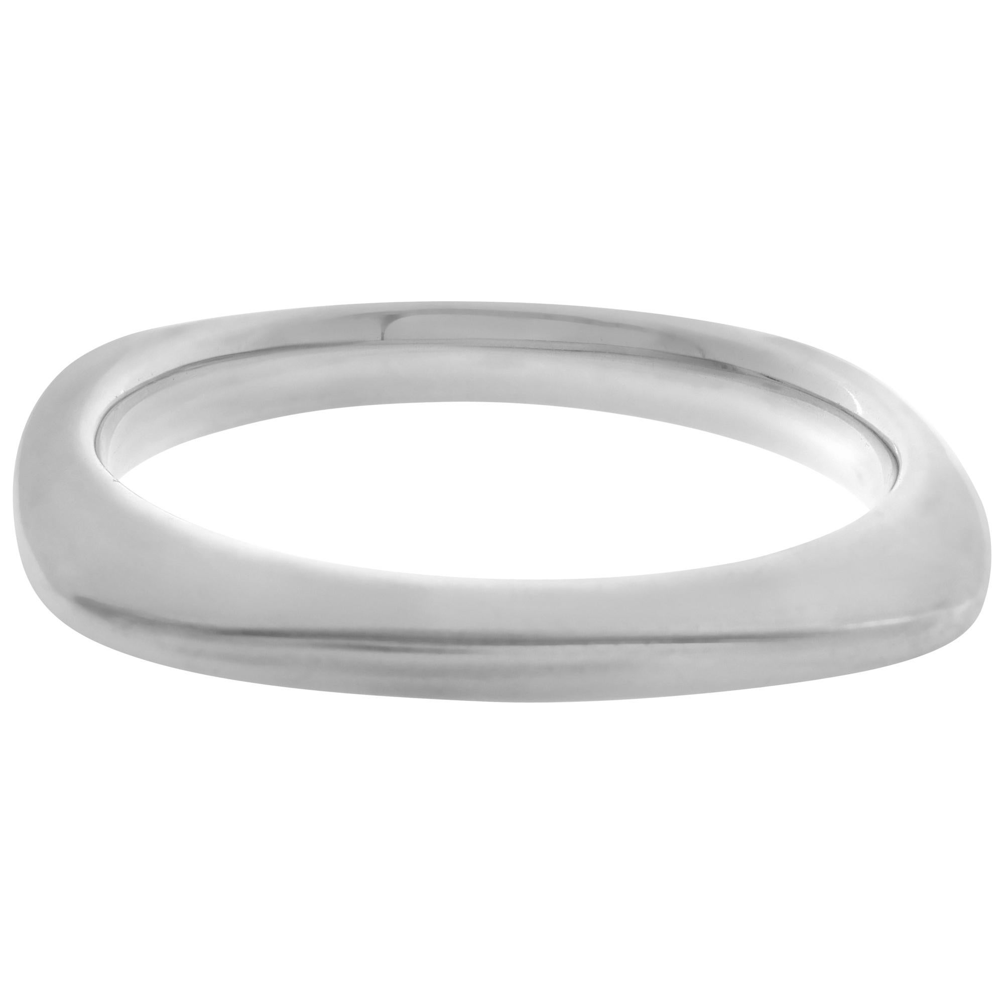 Tiffany & Co. cushion square bangle bracelet in sterling silver. The bracelet measures approximately 9mm at its widest points and rises approx. 7mm to 12mm from the hand, fits 6-7 inches wrist.