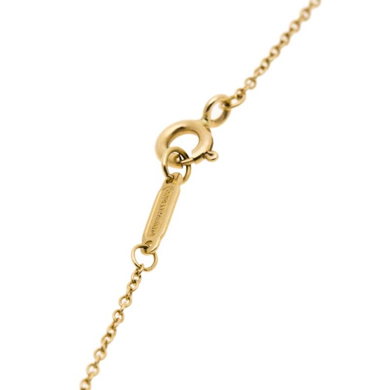 cc7768670b680 Tiffany & Co. Daisy Key Diamond 18k Yellow Gold Pendant Necklace