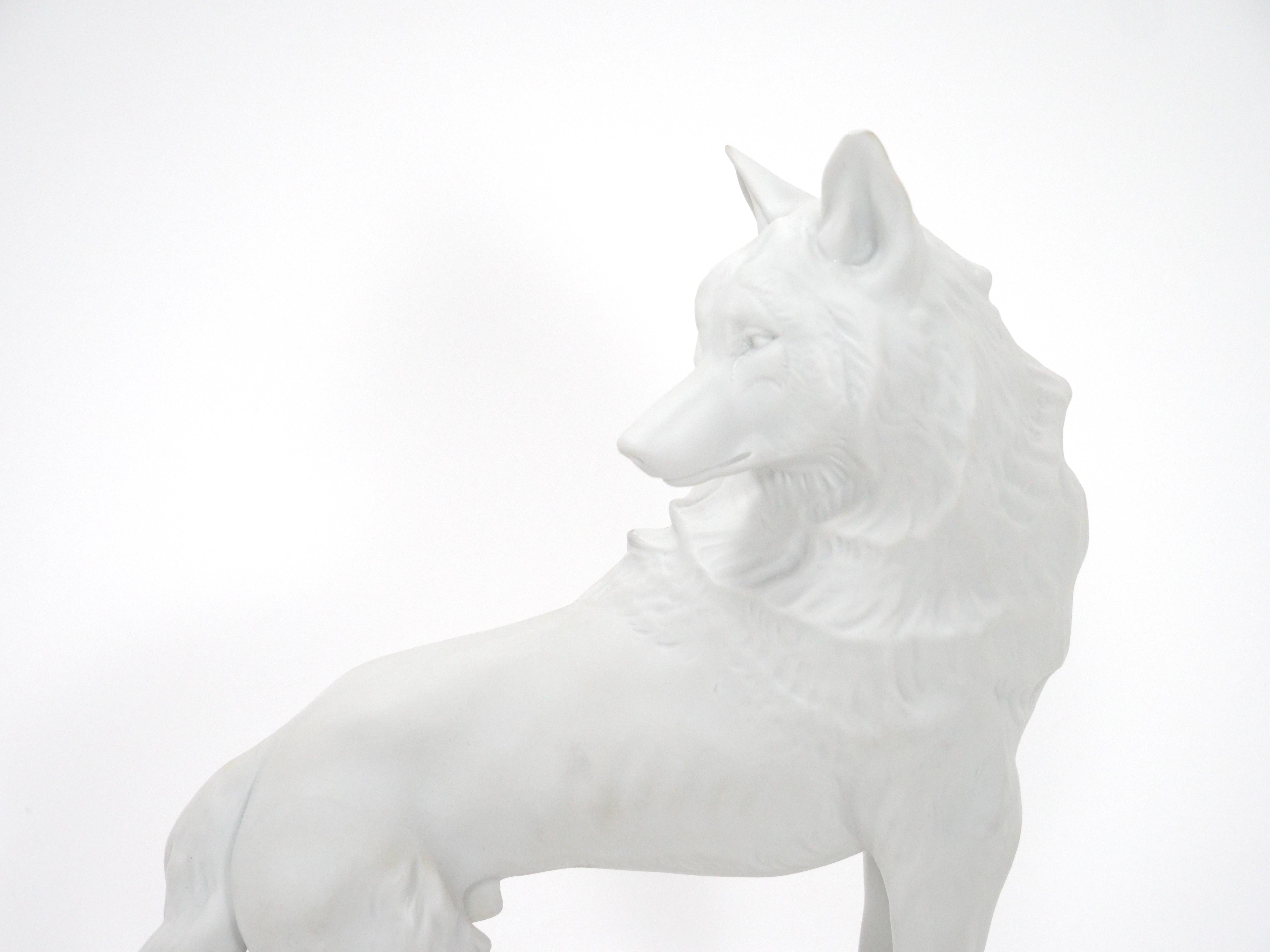 Discover the exceptional artistry of this exquisite Tiffany & Co decorative wolf sculpture, crafted in the early 20th century by the esteemed Nymphenburg Porcelain in Germany. This beautiful sculpture showcases the mastery of white bisque porcelain,