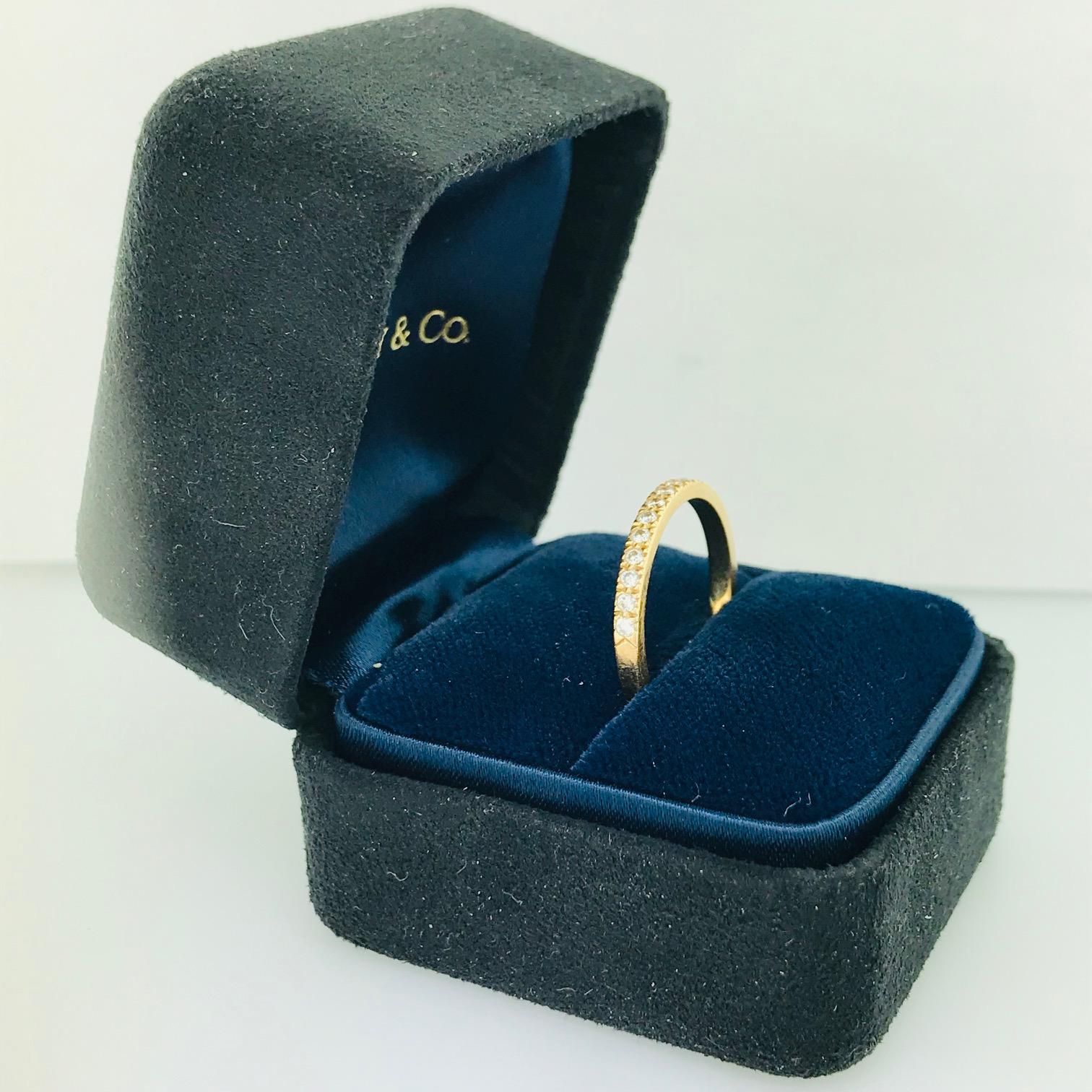This is a Tiffany & Co. original piece with the original box. The 18 karat rose gold diamond band is stunning with bright white round brilliant diamonds. This ring has .30 carats total diamond weight and VS2 clarity and G color diamonds.  Always the