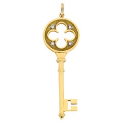 Tiffany & Co. Diamond 18 Karat Yellow Gold Quatrefoil Key Pendant