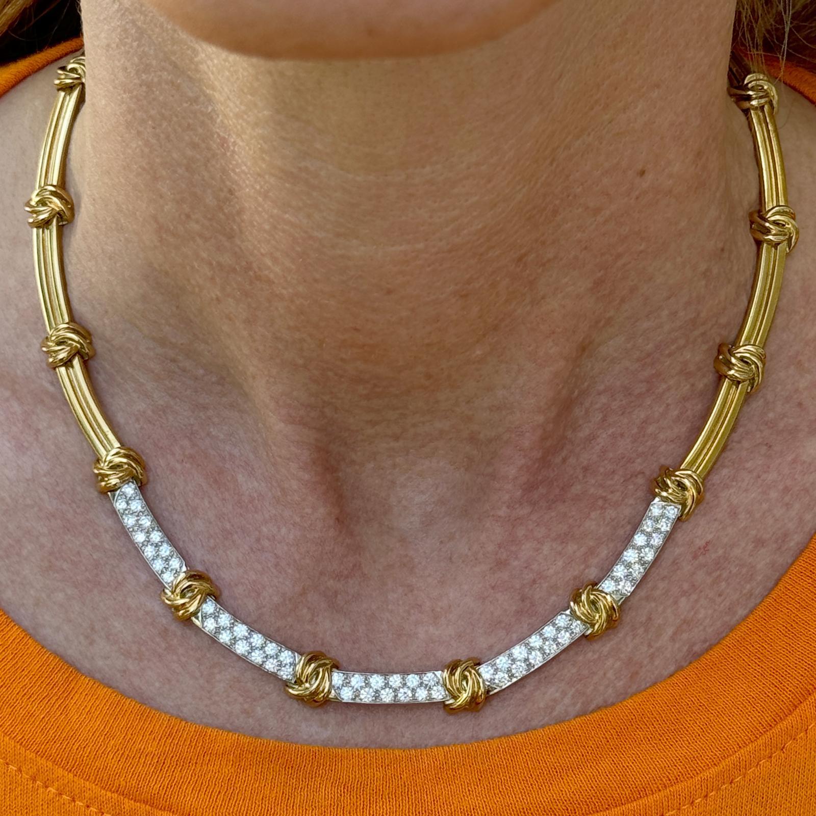 This Tiffany & Company diamond link necklace is a breathtaking piece of jewelry that epitomizes elegance and luxury. Crafted with exquisite craftsmanship, this necklace features a series of interlocking diamond links set in lustrous 18 karat yellow