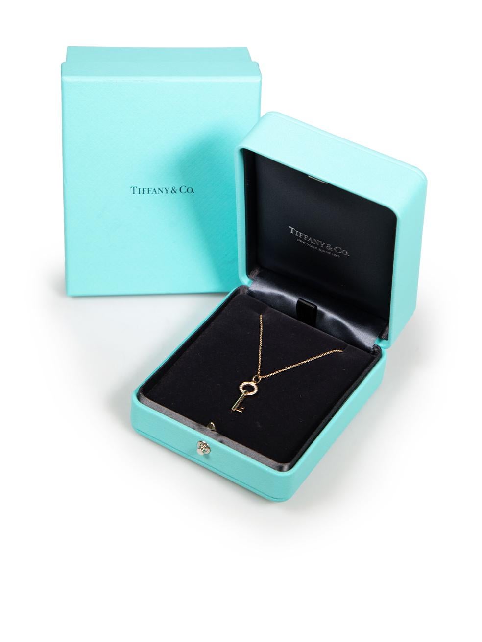 Women's Tiffany & Co. Diamond 18K Gold Modern Open Round Key Pendant Necklace For Sale