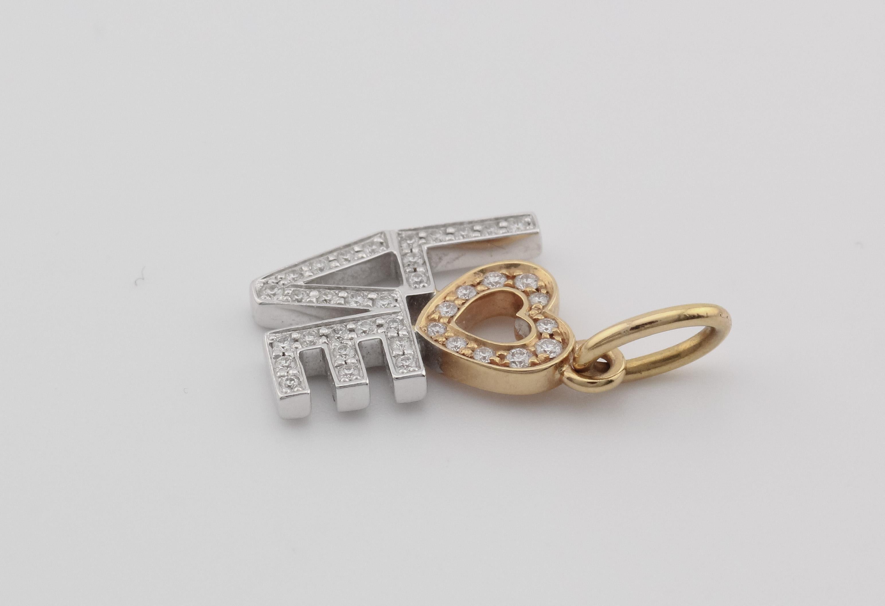 Tiffany & Co. Diamond 18K White Pink Gold Love Charm Pendant In Good Condition In Simpsonville, SC