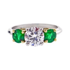 Tiffany 
Co. Diamond and Emerald Three-Stone Ring
