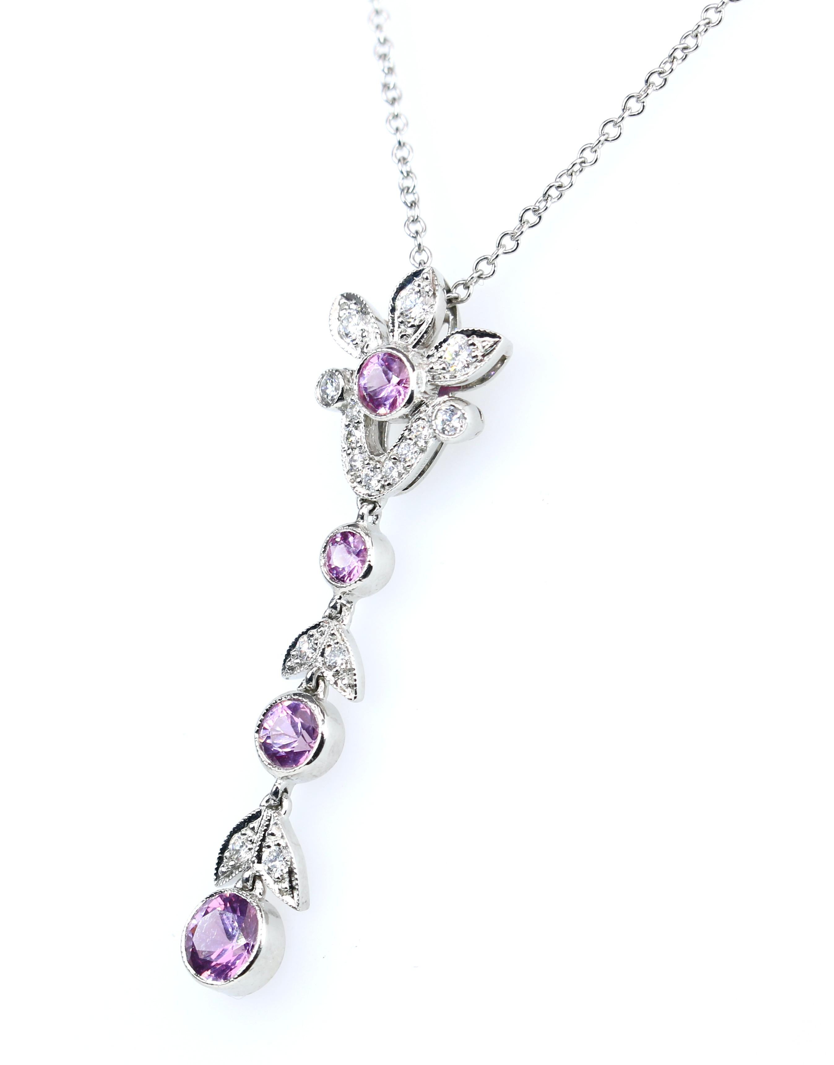 Platinum Diamond and Pink Sapphire 16 inch pendant necklace.
This pendant has approximately .30 CTW diamonds and approximately .80 CTW pink sapphires.
Pendant marked T&Co PT 950 and number. 