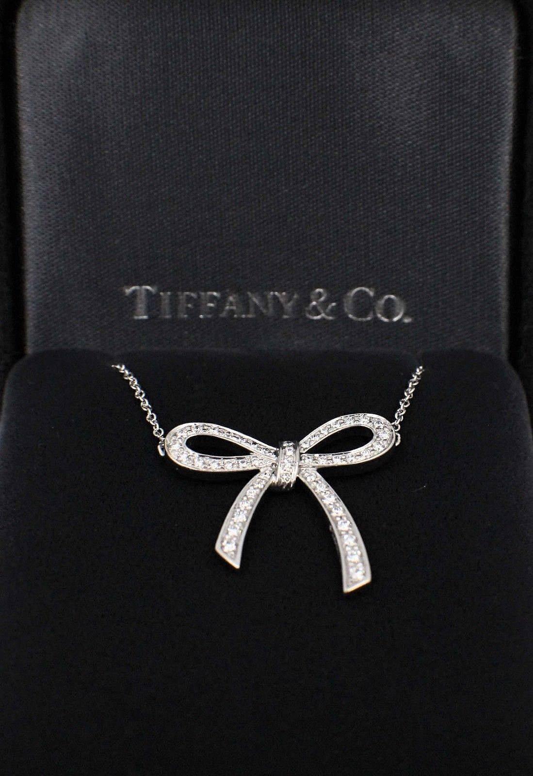 Tiffany & Co.
Style:  Diamond Bow Necklace
Metal:  Platinum PT950
Length:  16.25