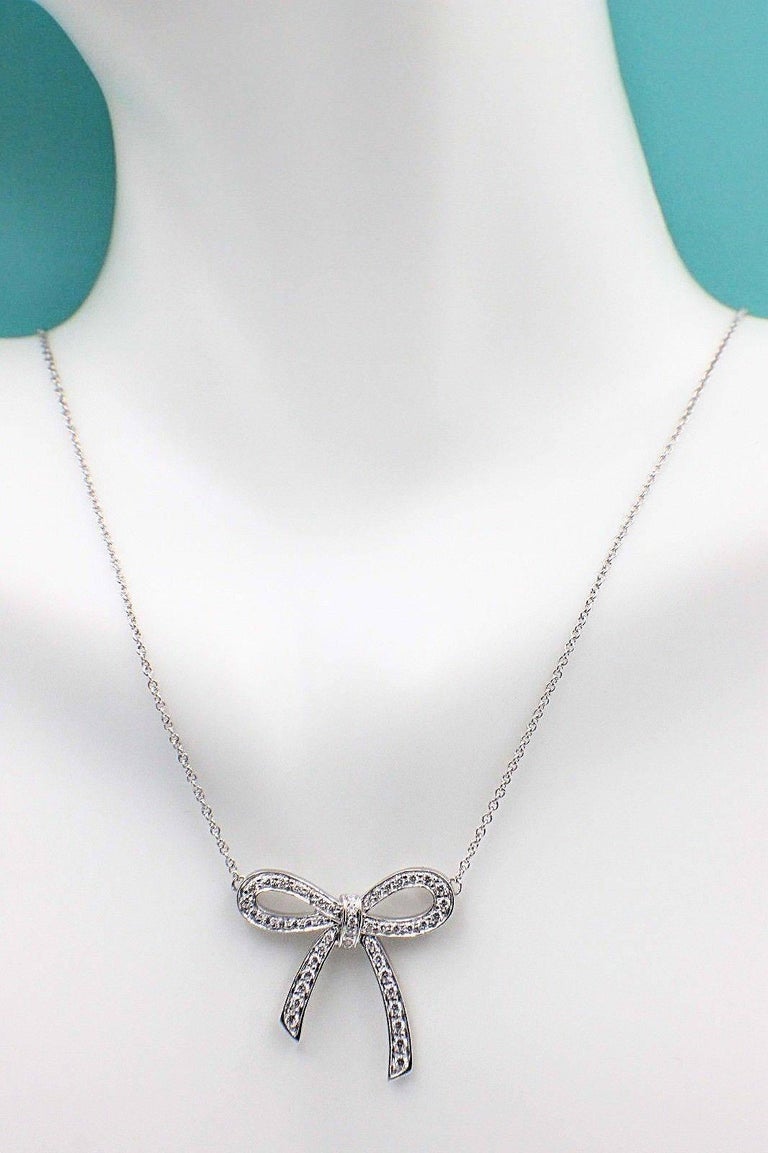 Tiffany and Co. Diamond and Platinum Bow Pendant Necklace For Sale at 1stDibs tiffany platinum