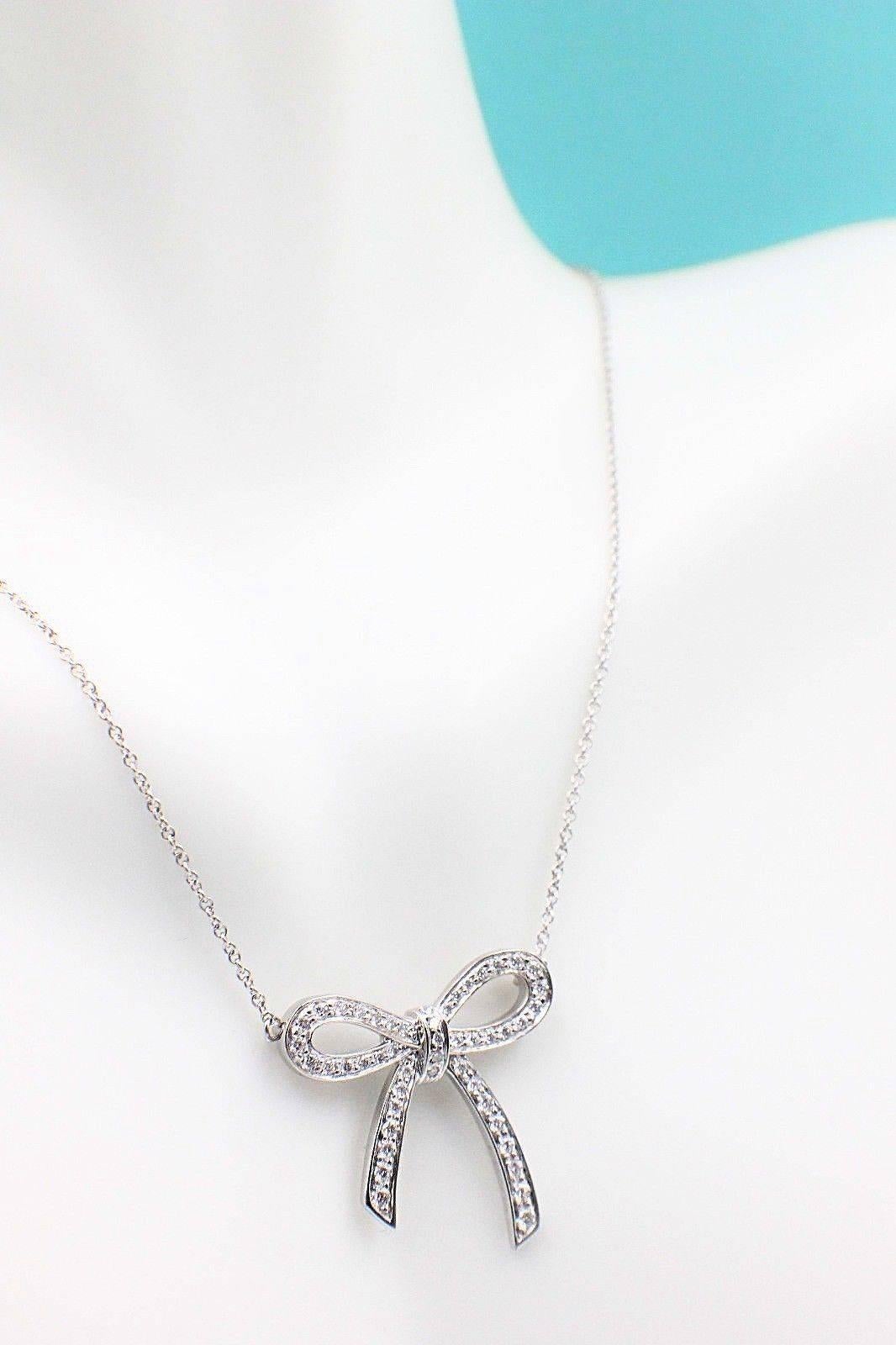 Tiffany & Co. Diamond and Platinum Bow Pendant Necklace In Excellent Condition In San Diego, CA