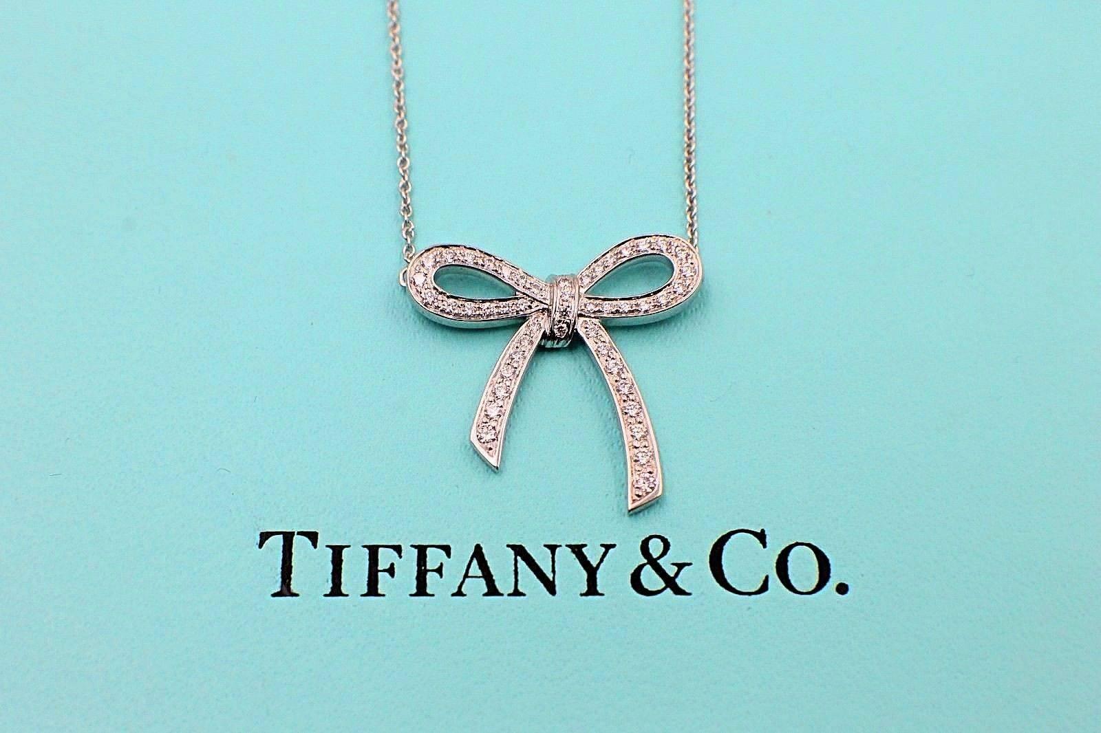 Women's or Men's Tiffany & Co. Diamond and Platinum Bow Pendant Necklace