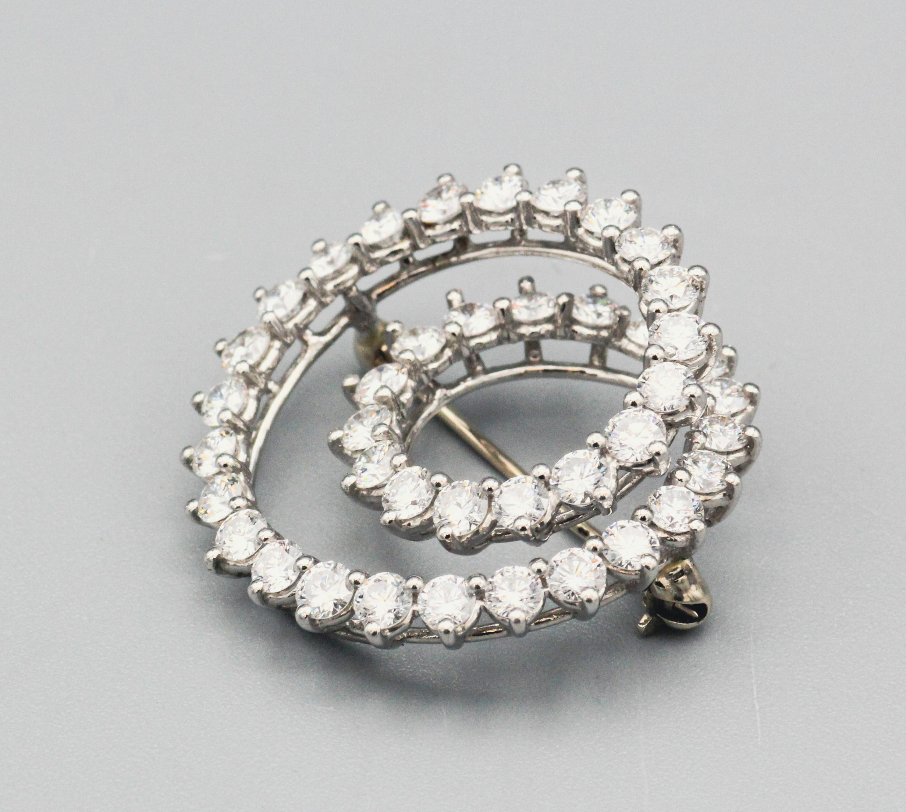 Women's Tiffany & Co. Diamond and Platinum Swirl Brooch  For Sale