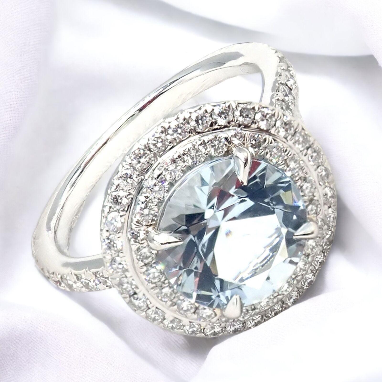 Platinum Diamond Aquamarine Soleste Ring by Tiffany & Co. 
With Aquamarine - 8mm, 0.70ct
Round Brilliant Cut Diamonds VS1 clarity, G color total weight approximately 0.43ctw
This ring comes with Tiffany & Co Box.
The Authentic Tiffany & Co Platinum