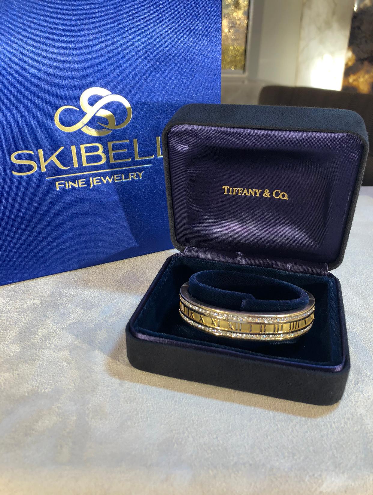 Tiffany & Co. Bracelet Atlas de diamants en or jaune 18K. Le bracelet comporte 3,50ctw de diamants ronds brillants. Le bracelet est large d'un demi-pouce, a une circonférence intérieure de 7,25 pouces et pèse 53 grammes. Signé Tiffany Co Italy 1995.