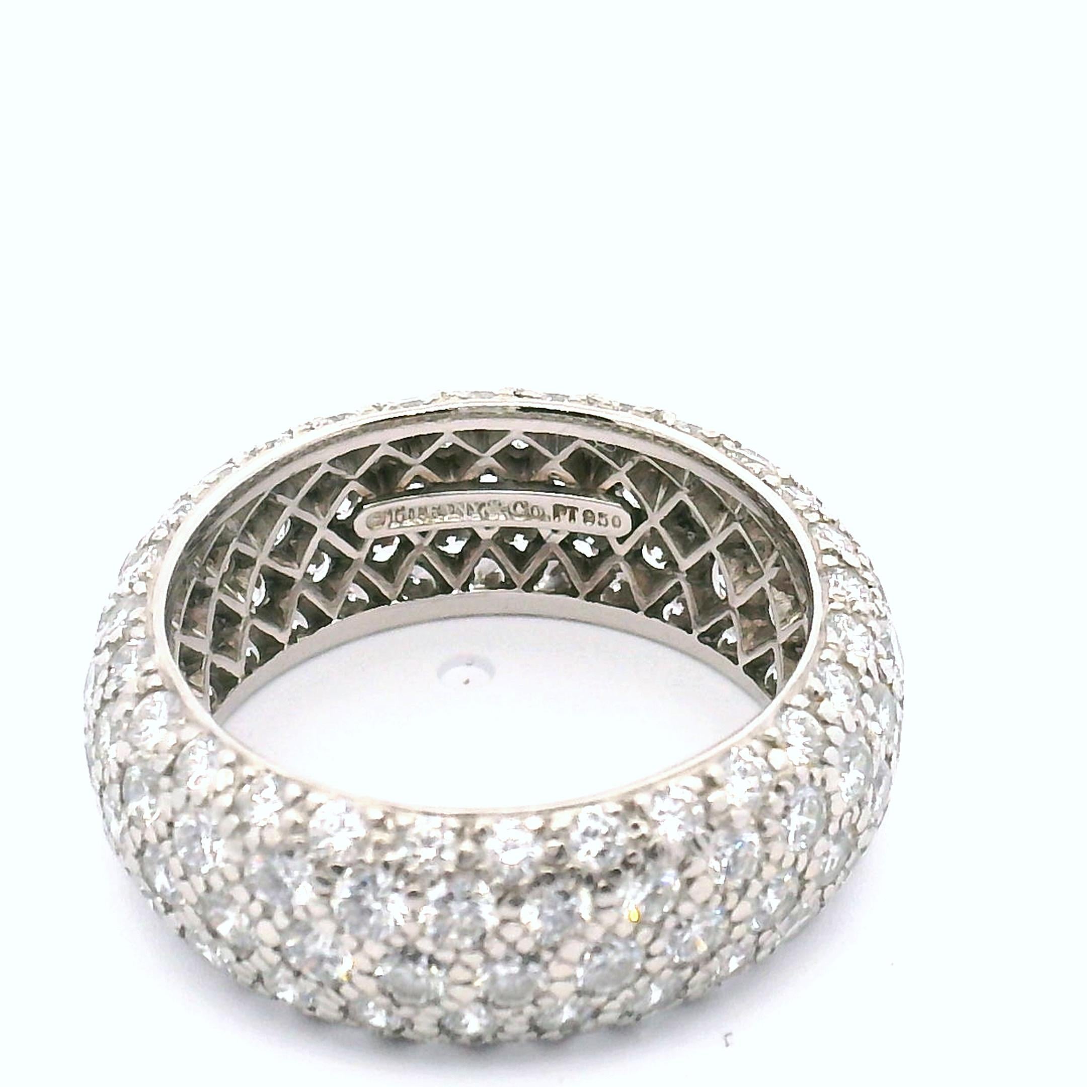 Tiffany & Co. Lady's platinum five row domed band with 140 round brilliant cut diamonds; 56-.03ct. approximately 3.40cttw. 

Clarity grade is VVS1
Color grade is E-F

Platinum 7.7 grams 