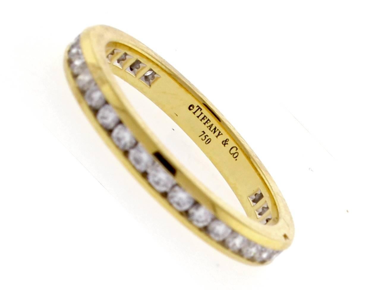 From Tiffany  & Co., a full circle of diamonds in this chancel set band ring. Thirty-four brilliant Tiffany diamonds weighing approximately  .75 carats,  Diamond G color VVS,      size 6,   2.7mm wide. 